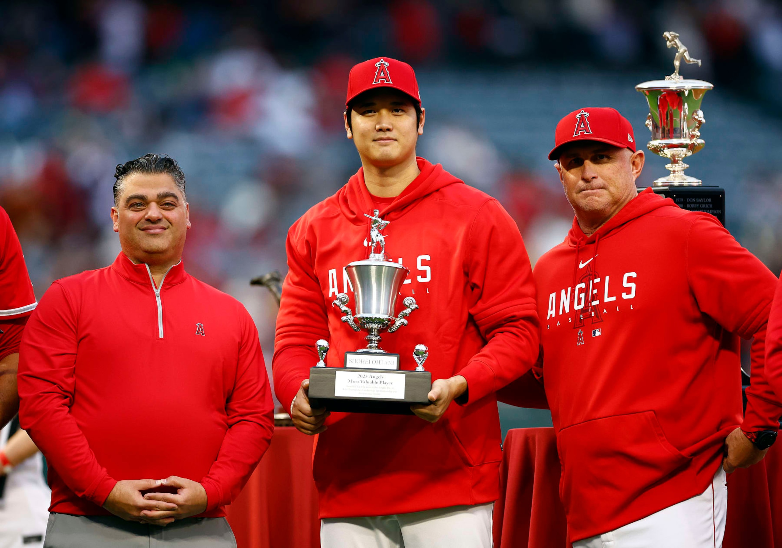ANAHEIM, CALIFORNIA - SEPTEMBER 30:  General Manager Perry Minasian, Shohei Ohtani #17 of the Los Angeles Angels and Phil Nevin at Angel Stadium of Anaheim on September 30, 2023 in Anaheim, California. (Photo by Ronald Martinez/Getty Images)