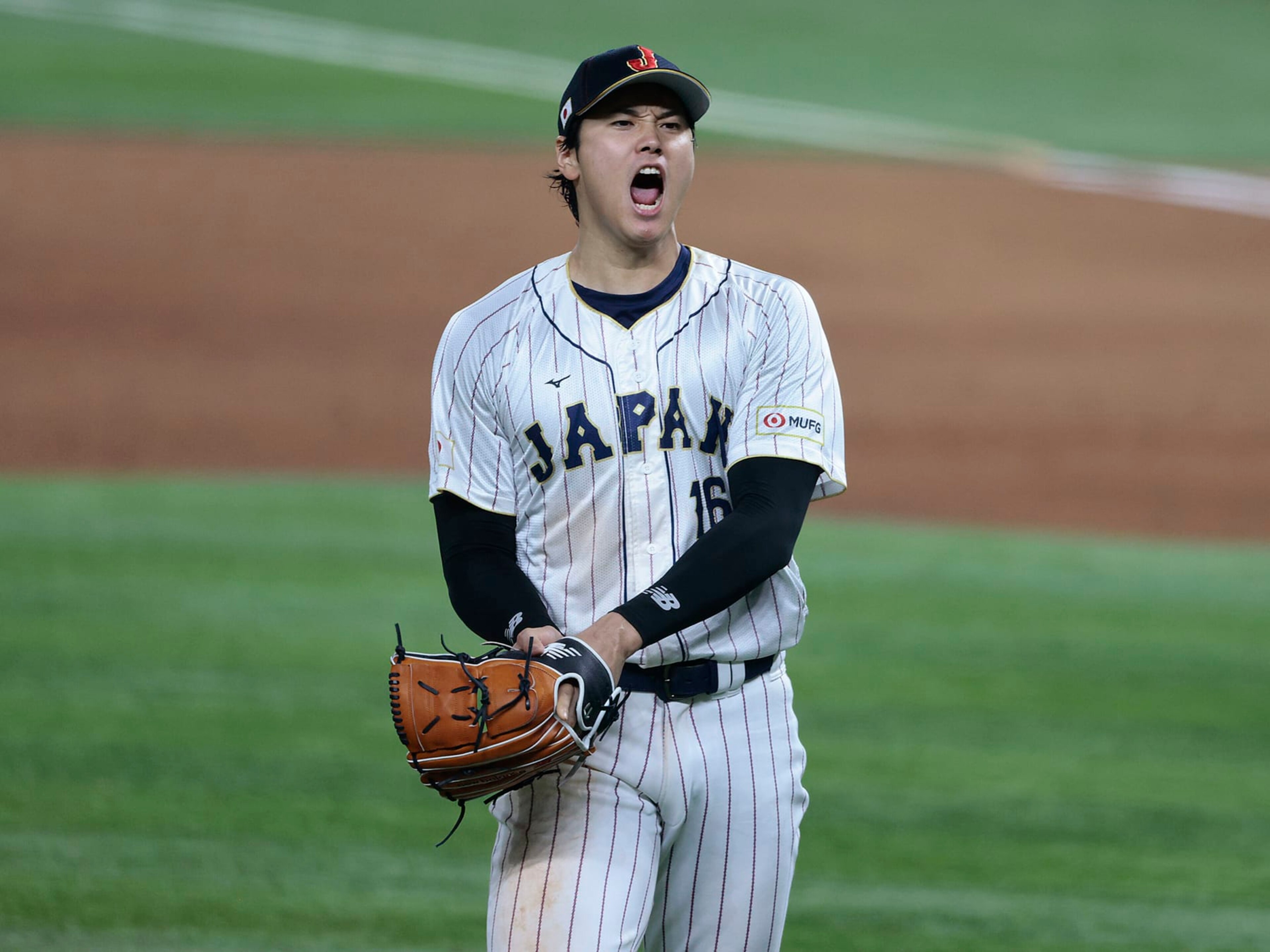 MIAMI, FL - MARCH 21: Shohei Ohtani #16 of Team Japan reacts after the final out in the top of the 9th inning to defeat Team USA 3-2 during World Baseball Classic Championship at loanDepot park on March 21, 2023 in Miami, Florida. (Photo by Christopher Pasatieri/Getty Images) MIAMI, FL - MARCH 21: Shohei Ohtani #16 of Team Japan reacts after the final out in the top of the 9th inning to defeat Team USA 3-2 during World Baseball Classic Championship at loanDepot park on March 21, 2023 in Miami, Florida. (Photo by Christopher Pasatieri/Getty Images)
