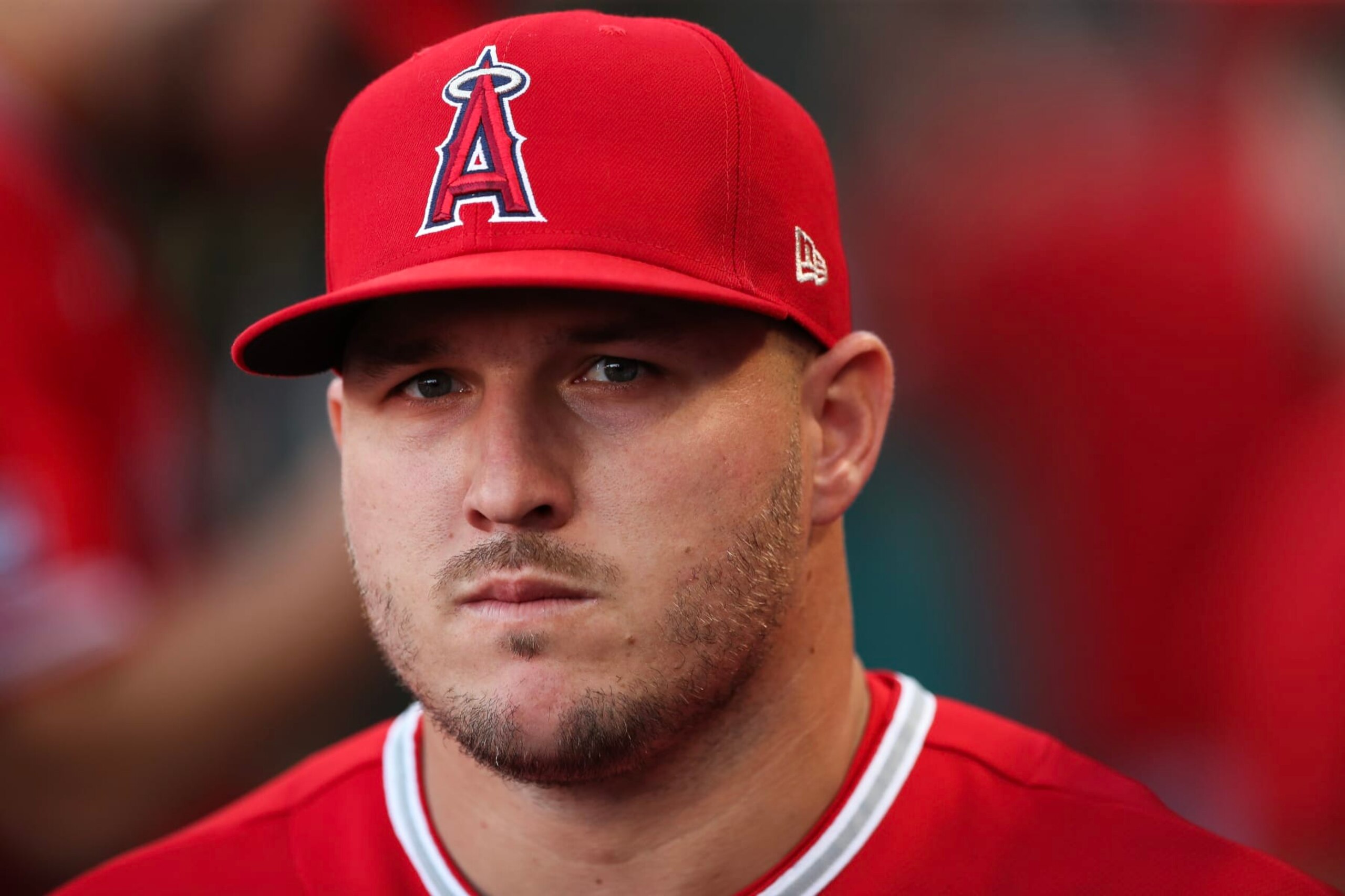 ANAHEIM, CALIFORNIA - AUGUST 22: Mike Trout #27 of the Los Angeles Angels looks on from the dugout ahead of the game against the Cincinnati Reds at Angel Stadium of Anaheim on August 22, 2023 in Anaheim, California. (Photo by Meg Oliphant/Getty Images)
