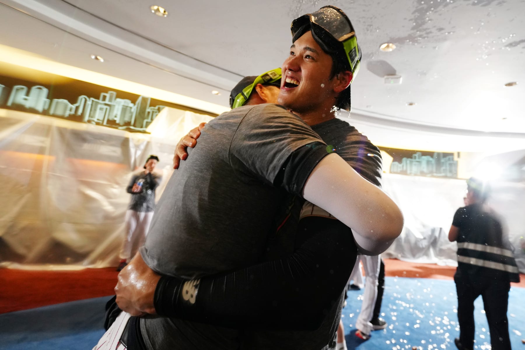 MIAMI, FL - MARCH 21:  Shohei Ohtani #16 of Team Japan celebrates with teammates in the locker room after Team Japan defeated Team USA, 3-2, in the 2023 World Baseball Classic Championship game at loanDepot Park on Tuesday, March 21, 2023 in Miami, Florida. (Photo by Daniel Shirey/WBCI/MLB Photos via Getty Images)