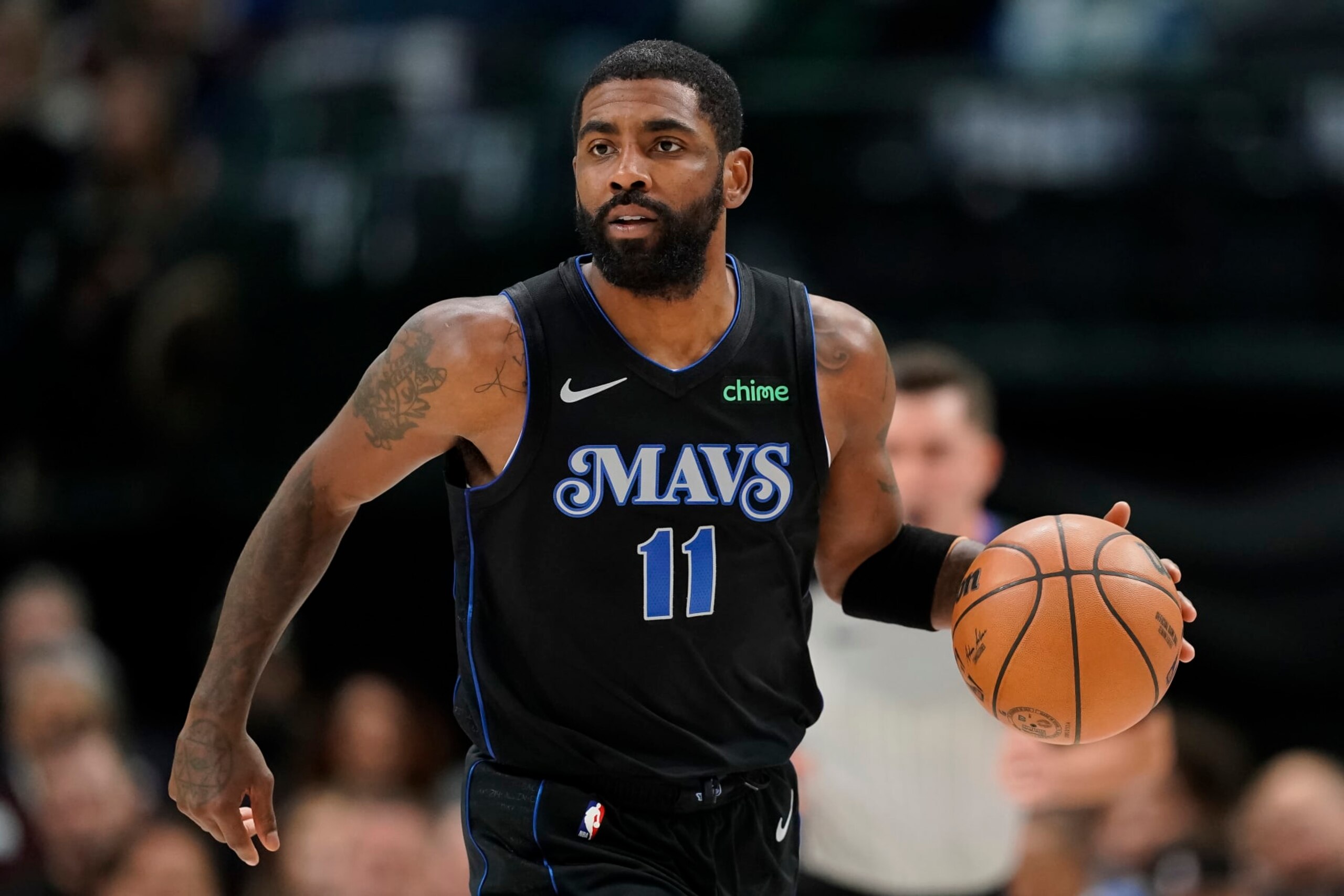 DALLAS, TEXAS - DECEMBER 06: Kyrie Irving #11 of the Dallas Mavericks brings the ball downcourt during the first half against the Utah Jazz at American Airlines Center on December 06, 2023 in Dallas, Texas. NOTE TO USER: User expressly acknowledges and agrees that, by downloading and/or using this Photograph, user is consenting to the terms and conditions of the Getty Images License Agreement. (Photo by Sam Hodde/Getty Images)