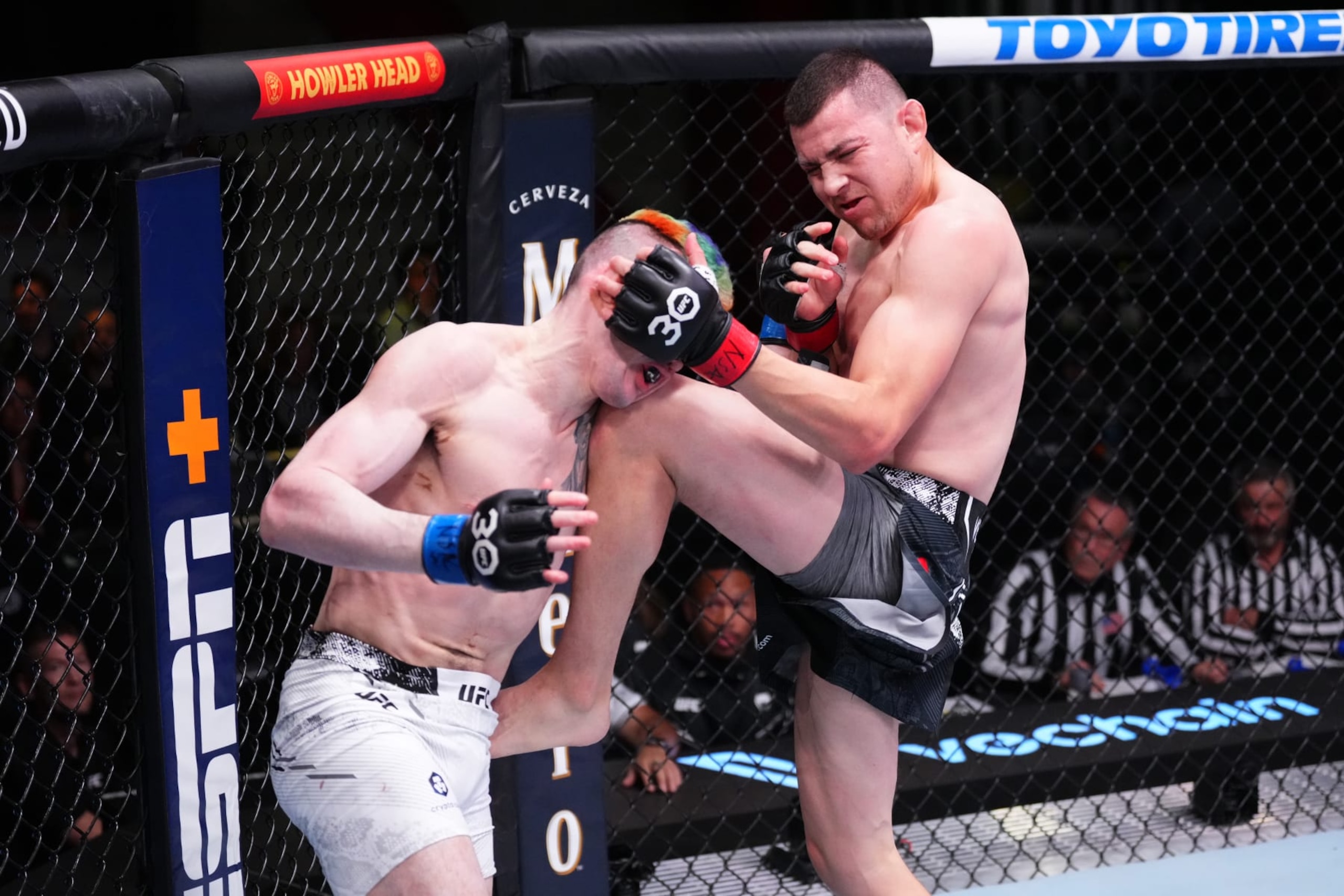 Steve Garcia knees Melquizael Costa of Brazil