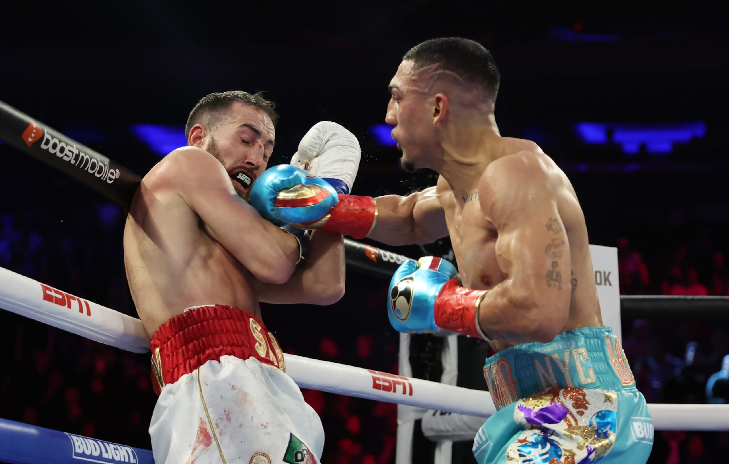 NEW YORK, NEW YORK - DECEMBER 10:  Teofimo Lopez  punchesSandor Martin during their junior welterweight bout at Madison Square Garden on December 10, 2022 in New York City. (Photo by Al Bello/Getty Images)
