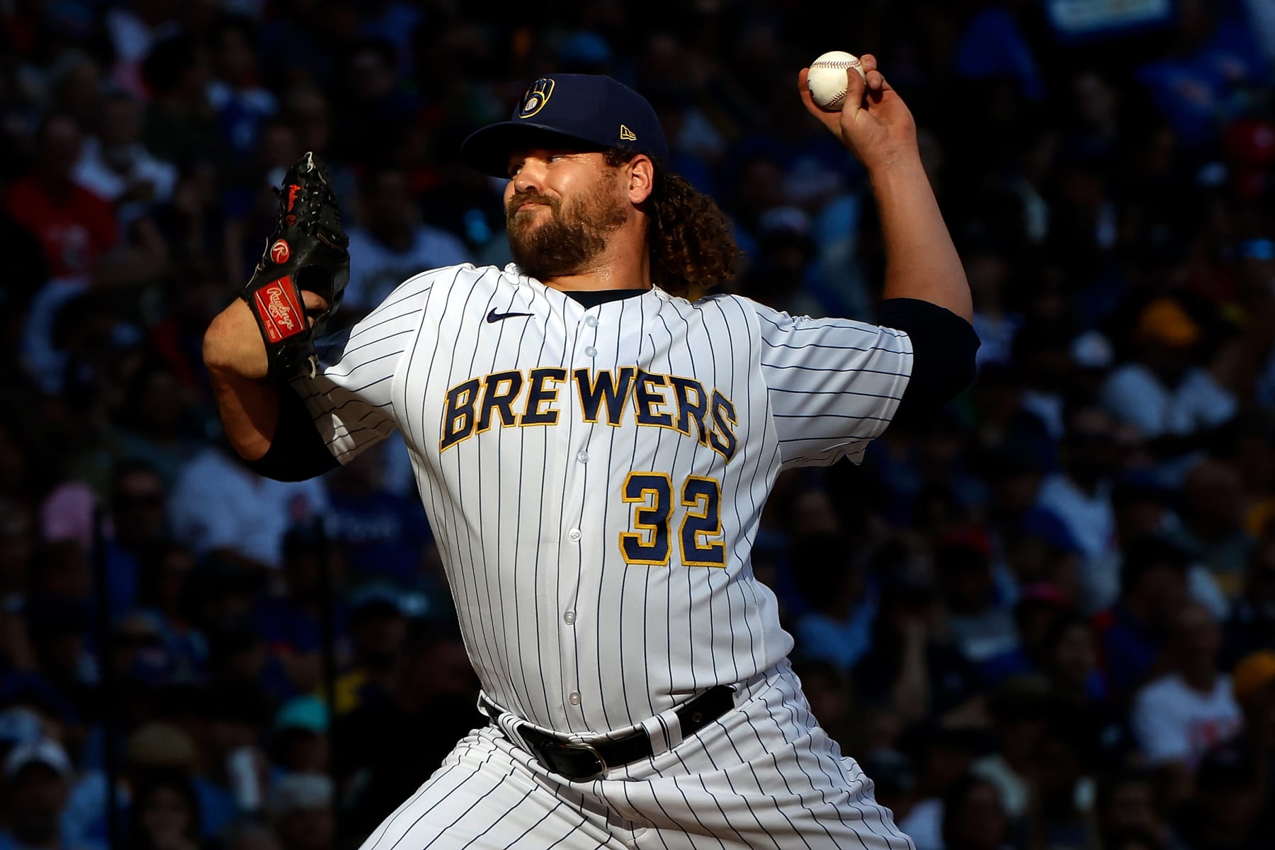MILWAUKEE, WISCONSIN - OCTOBER 01: Andrew Chafin #32 of the Milwaukee Brewers pitches in the sixth inning against the Chicago Cubs at American Family Field on October 01, 2023 in Milwaukee, Wisconsin. (Photo by John Fisher/Getty Images)