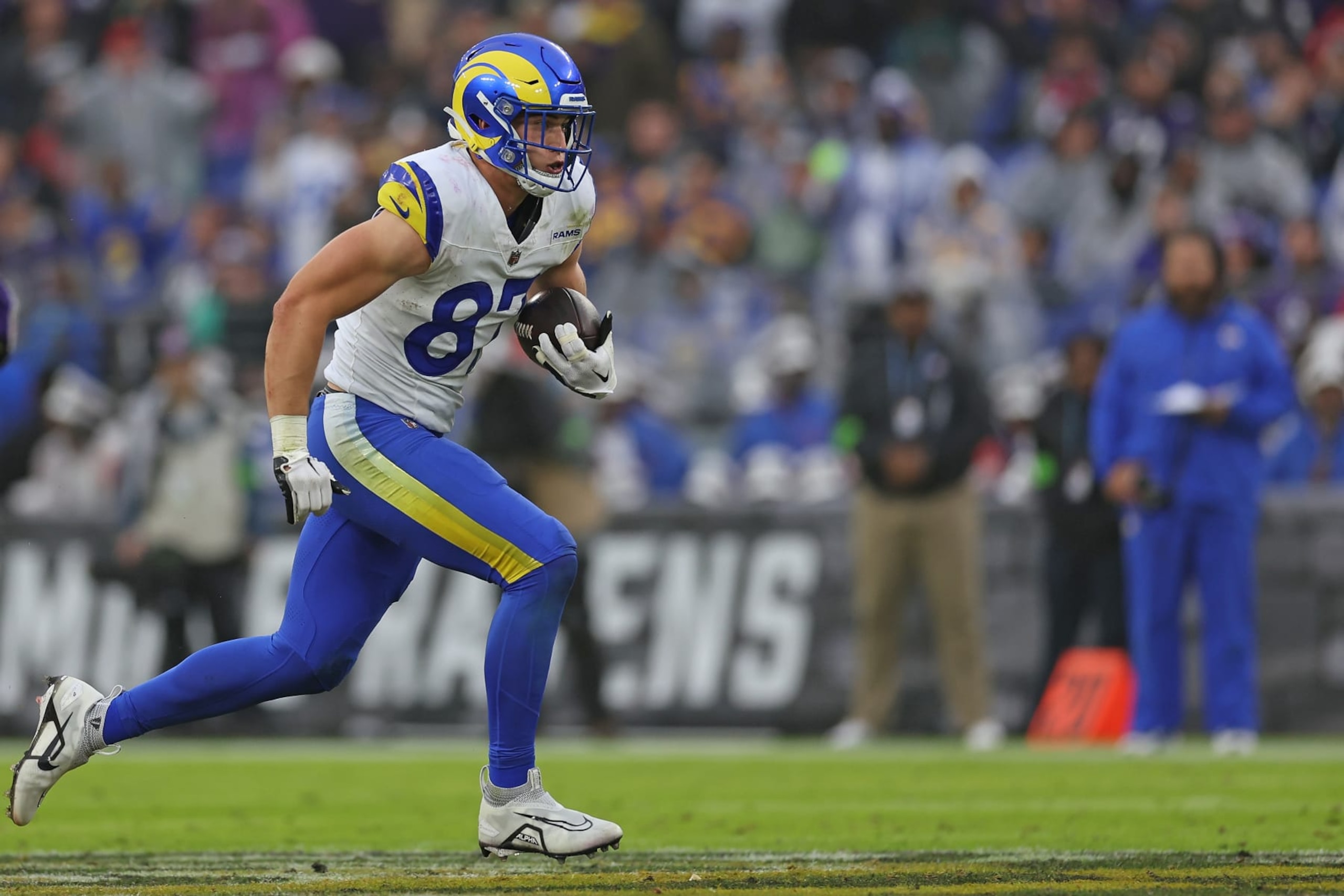 BALTIMORE, MARYLAND - DECEMBER 10: Davis Allen #87 of the Los Angeles Rams runs the ball after a catch during the second quarter in the game against Baltimore Ravens at M&T Bank Stadium on December 10, 2023 in Baltimore, Maryland. (Photo by Todd Olszewski/Getty Images)