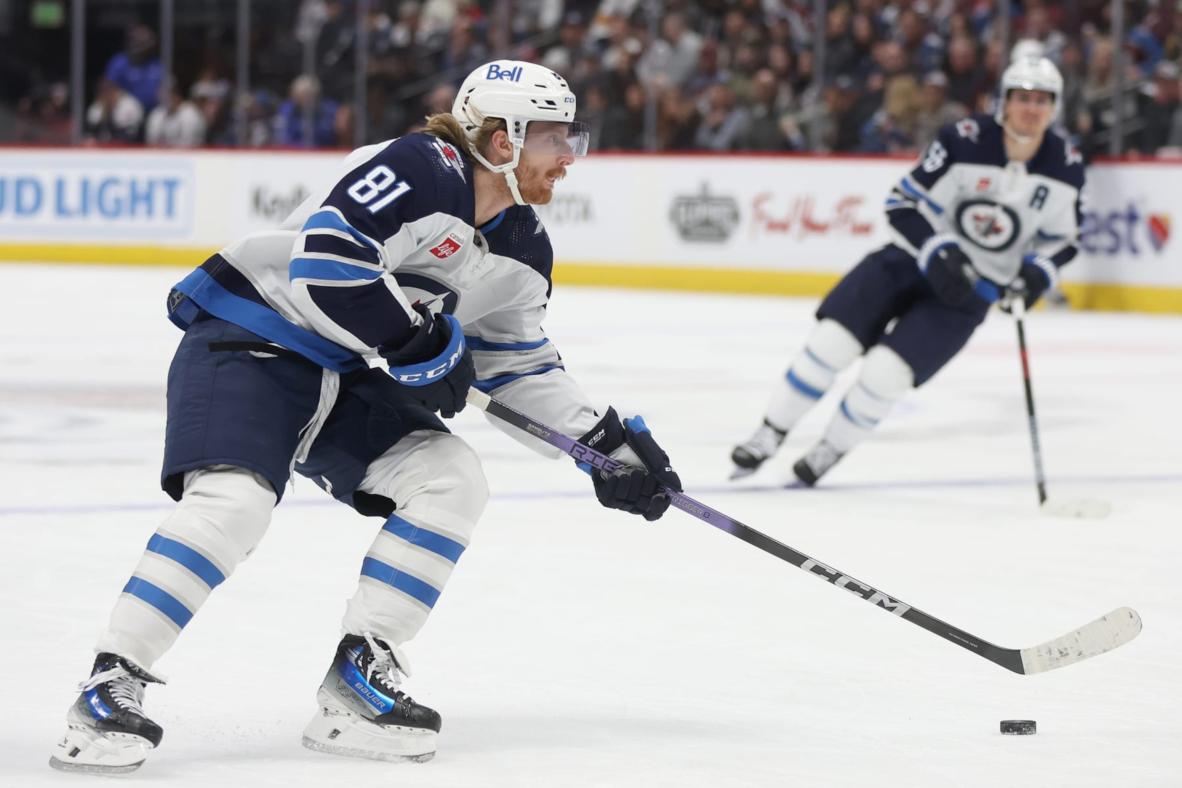 DENVER, COLORADO - DECEMBER 07: Kyle Connor #81 of the Winnipeg Jets looks for an opening against the Colorado Avalanche in the first period at Ball Arena on December 07, 2023 in Denver, Colorado. (Photo by Matthew Stockman/Getty Images) DENVER, COLORADO - DECEMBER 07: Kyle Connor #81 of the Winnipeg Jets looks for an opening against the Colorado Avalanche in the first period at Ball Arena on December 07, 2023 in Denver, Colorado. (Photo by Matthew Stockman/Getty Images)