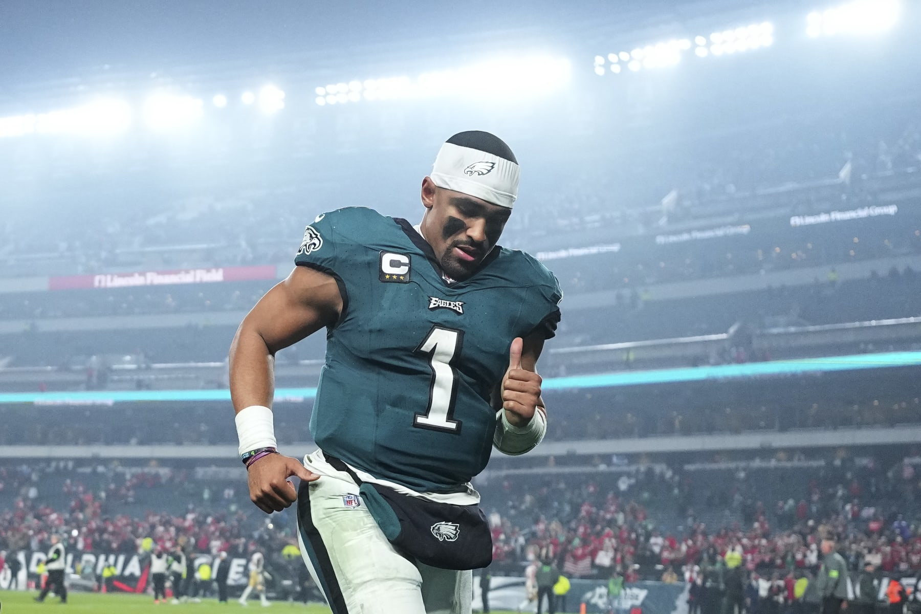 PHILADELPHIA, PENNSYLVANIA - DECEMBER 3: Jalen Hurts #1 of the Philadelphia Eagles runs off the field after the game against the San Francisco 49ers at Lincoln Financial Field on December 3, 2023 in Philadelphia, Pennsylvania. (Photo by Mitchell Leff/Getty Images) PHILADELPHIA, PENNSYLVANIA - DECEMBER 3: Jalen Hurts #1 of the Philadelphia Eagles runs off the field after the game against the San Francisco 49ers at Lincoln Financial Field on December 3, 2023 in Philadelphia, Pennsylvania. (Photo by Mitchell Leff/Getty Images)