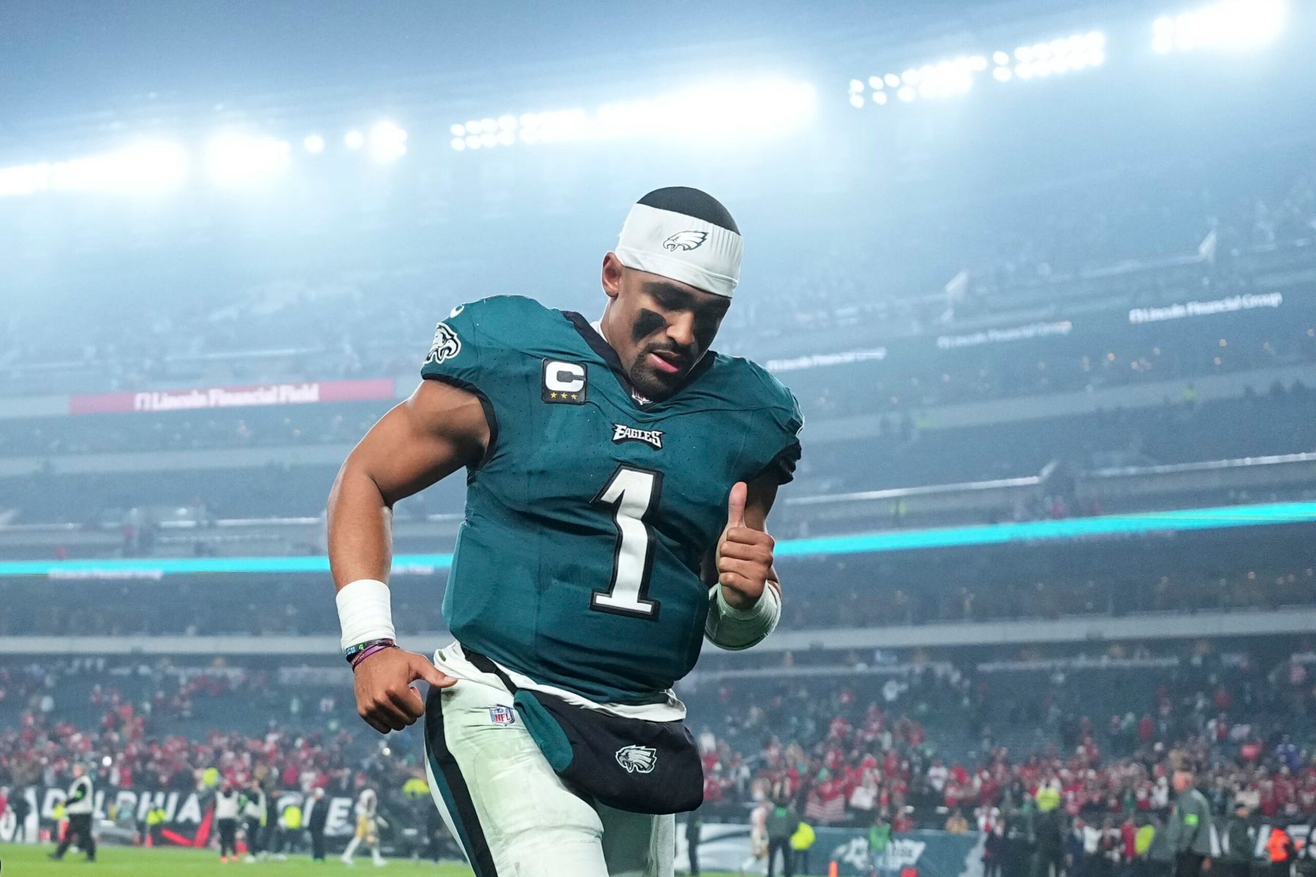 PHILADELPHIA, PENNSYLVANIA - DECEMBER 3: Jalen Hurts #1 of the Philadelphia Eagles runs off the field after the game against the San Francisco 49ers at Lincoln Financial Field on December 3, 2023 in Philadelphia, Pennsylvania. (Photo by Mitchell Leff/Getty Images) PHILADELPHIA, PENNSYLVANIA - DECEMBER 3: Jalen Hurts #1 of the Philadelphia Eagles runs off the field after the game against the San Francisco 49ers at Lincoln Financial Field on December 3, 2023 in Philadelphia, Pennsylvania. (Photo by Mitchell Leff/Getty Images)