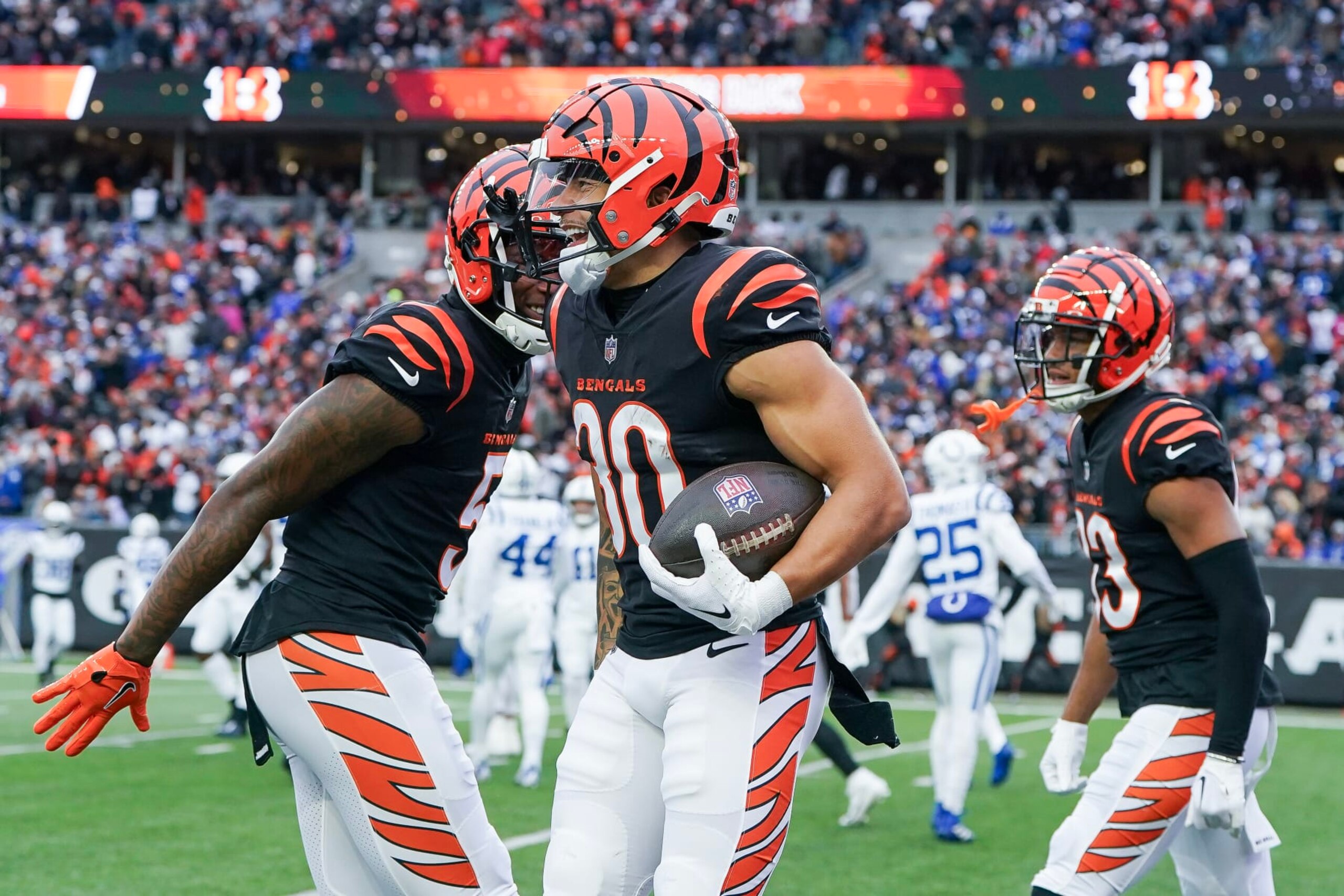 CINCINNATI, OHIO - DECEMBER 10: 
Chase Brown #30 of the Cincinnati Bengals reacts after scoring a touchdown during the first half of the game against the Indianapolis Colts at Paycor Stadium on December 10, 2023 in Cincinnati, Ohio. (Photo by Dylan Buell/Getty Images)