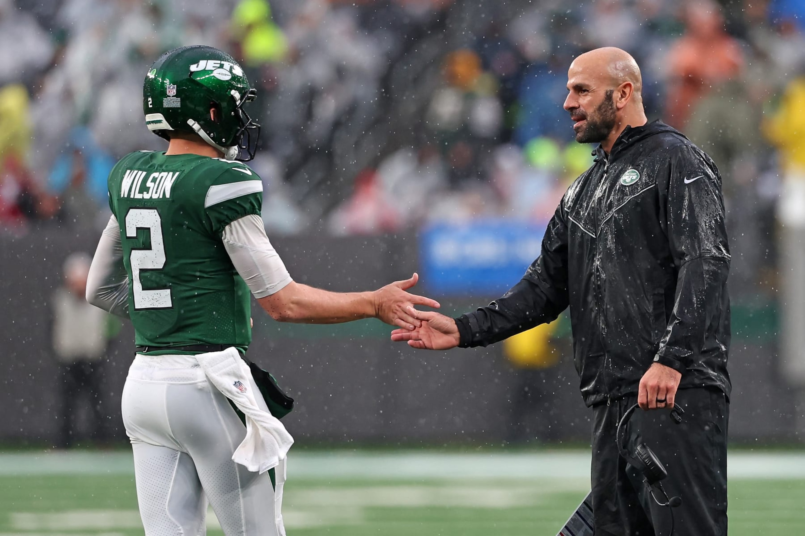 EAST RUTHERFORD, NEW JERSEY - DECEMBER 10: Head coach Robert Saleh of the New York Jets celebrates after a touchdown with Zach Wilson #2 during the third quarter in the game against the Houston Texans at MetLife Stadium on December 10, 2023 in East Rutherford, New Jersey. (Photo by Al Bello/Getty Images)