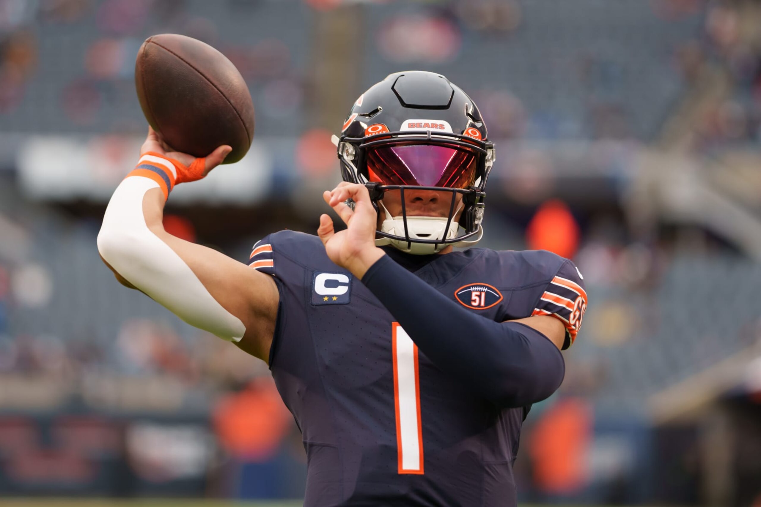 CHICAGO, IL - DECEMBER 10: Quarterback Justin Fields #1 of the Chicago Bears warms up prior to an NFL football game against the Detroit Lions at Soldier Field on December 10, 2023 in Chicago, Illinois. (Photo by Todd Rosenberg/Getty Images)