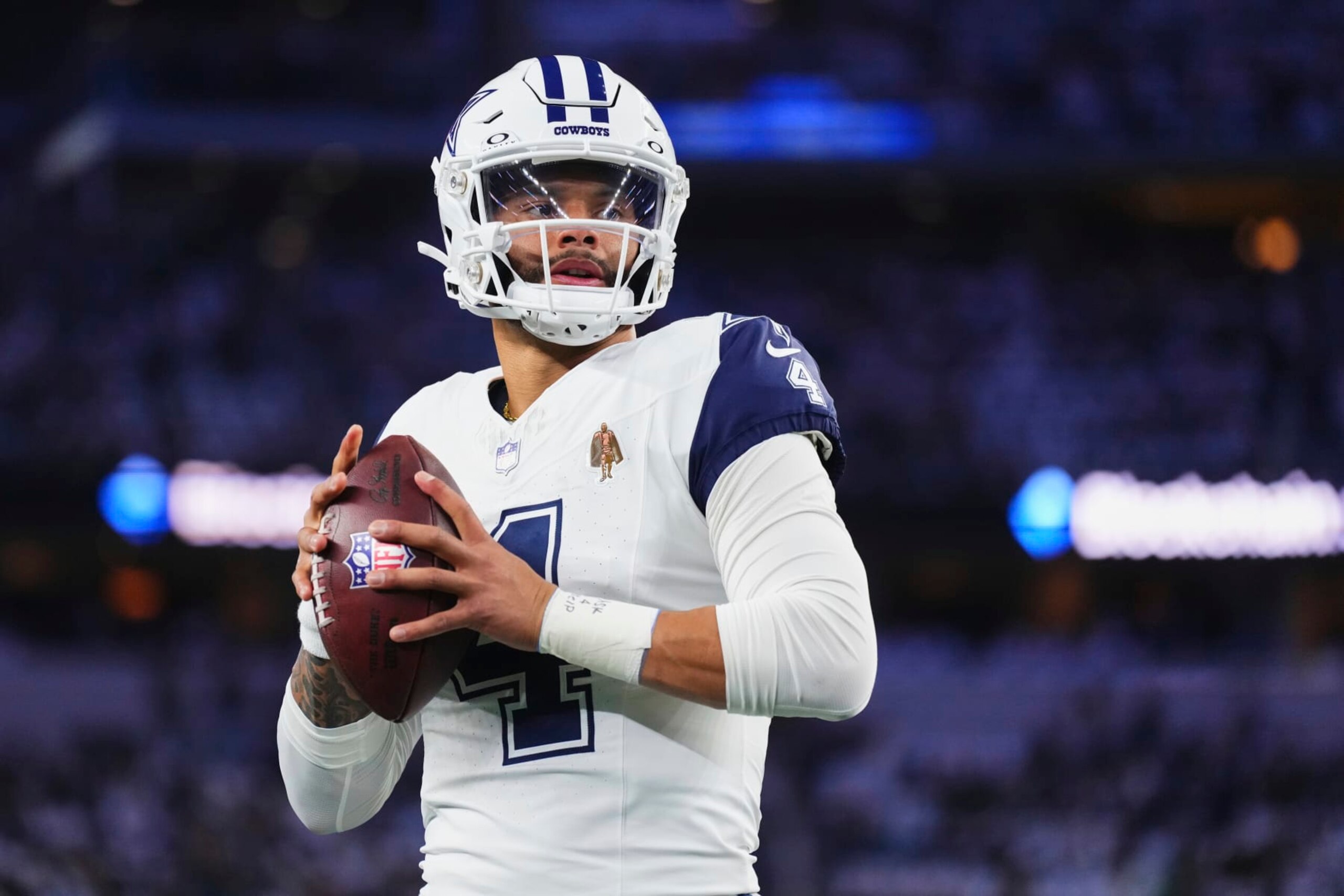 ARLINGTON, TX - DECEMBER 10: Dak Prescott #4 of the Dallas Cowboys warms up before kickoff against the Philadelphia Eagles at AT&T Stadium on December 10, 2023 in Arlington, Texas. (Photo by Cooper Neill/Getty Images)