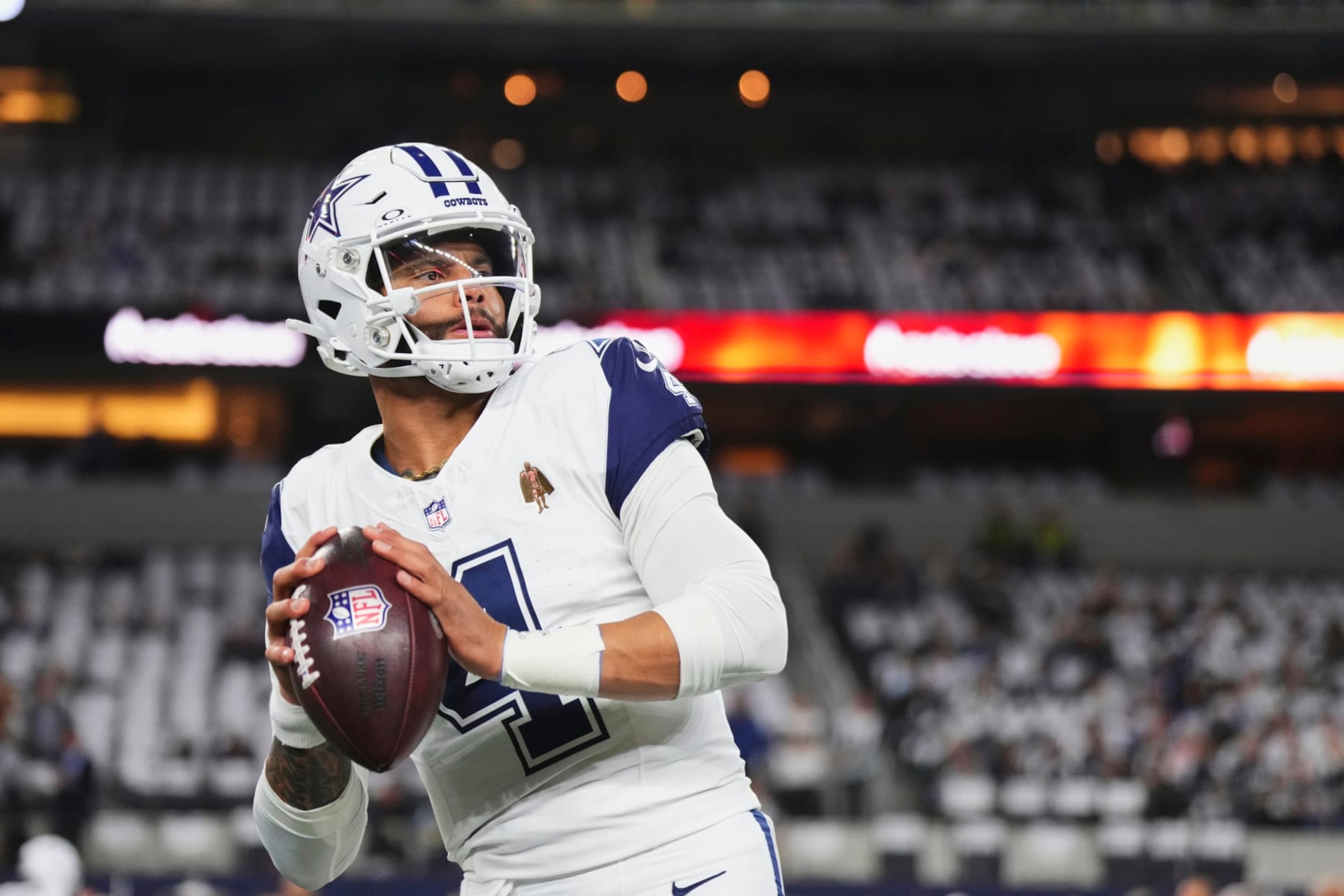 ARLINGTON, TX - DECEMBER 10: Dak Prescott #4 of the Dallas Cowboys warms up before kickoff against the Philadelphia Eagles at AT&T Stadium on December 10, 2023 in Arlington, Texas. (Photo by Cooper Neill/Getty Images)
