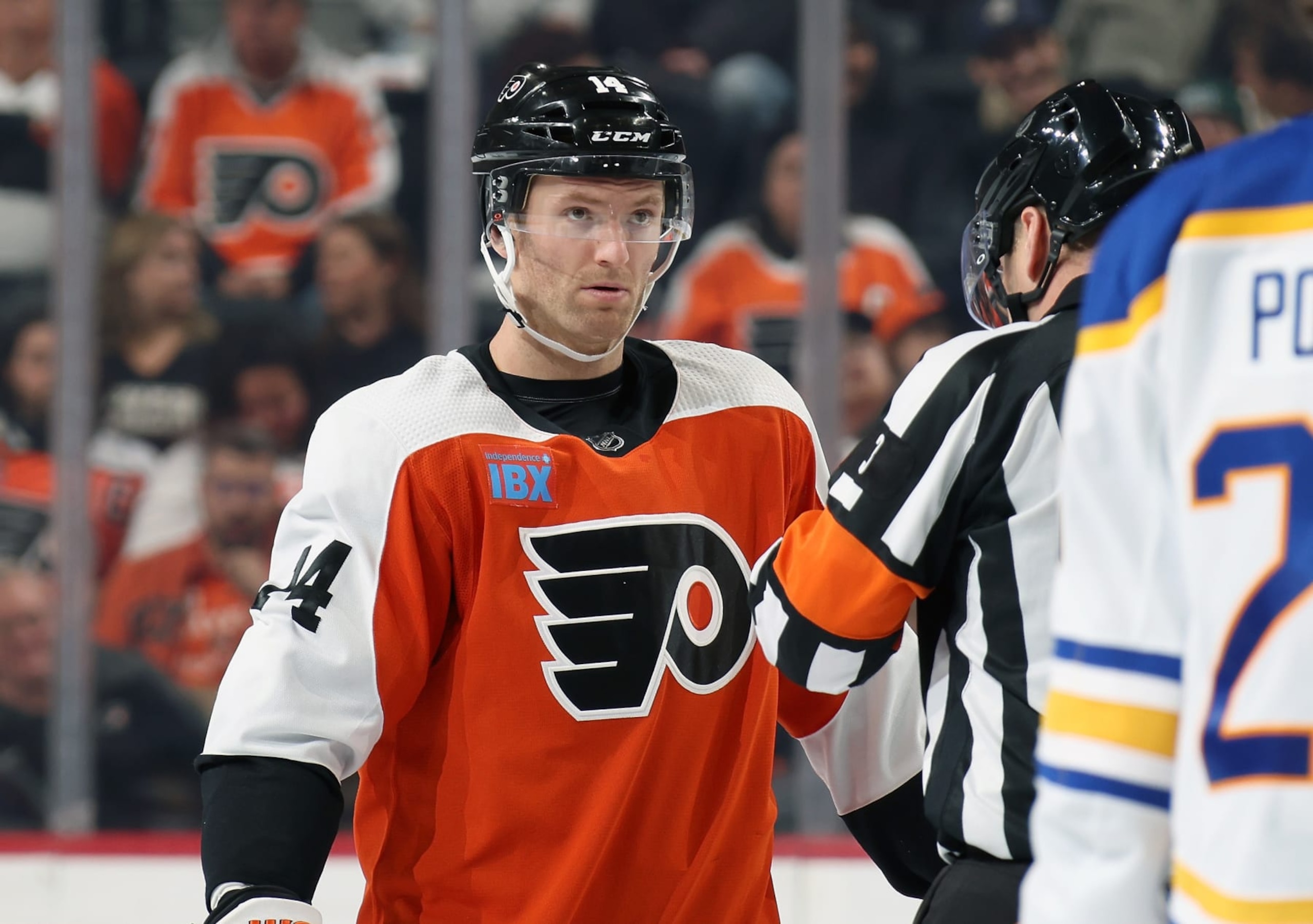 PHILADELPHIA, PENNSYLVANIA - NOVEMBER 01:  Sean Couturier #14 of the Philadelphia Flyers looks on against the Buffalo Sabres at the Wells Fargo Center on November 1, 2023 in Philadelphia, Pennsylvania.  (Photo by Len Redkoles/NHLI via Getty Images)