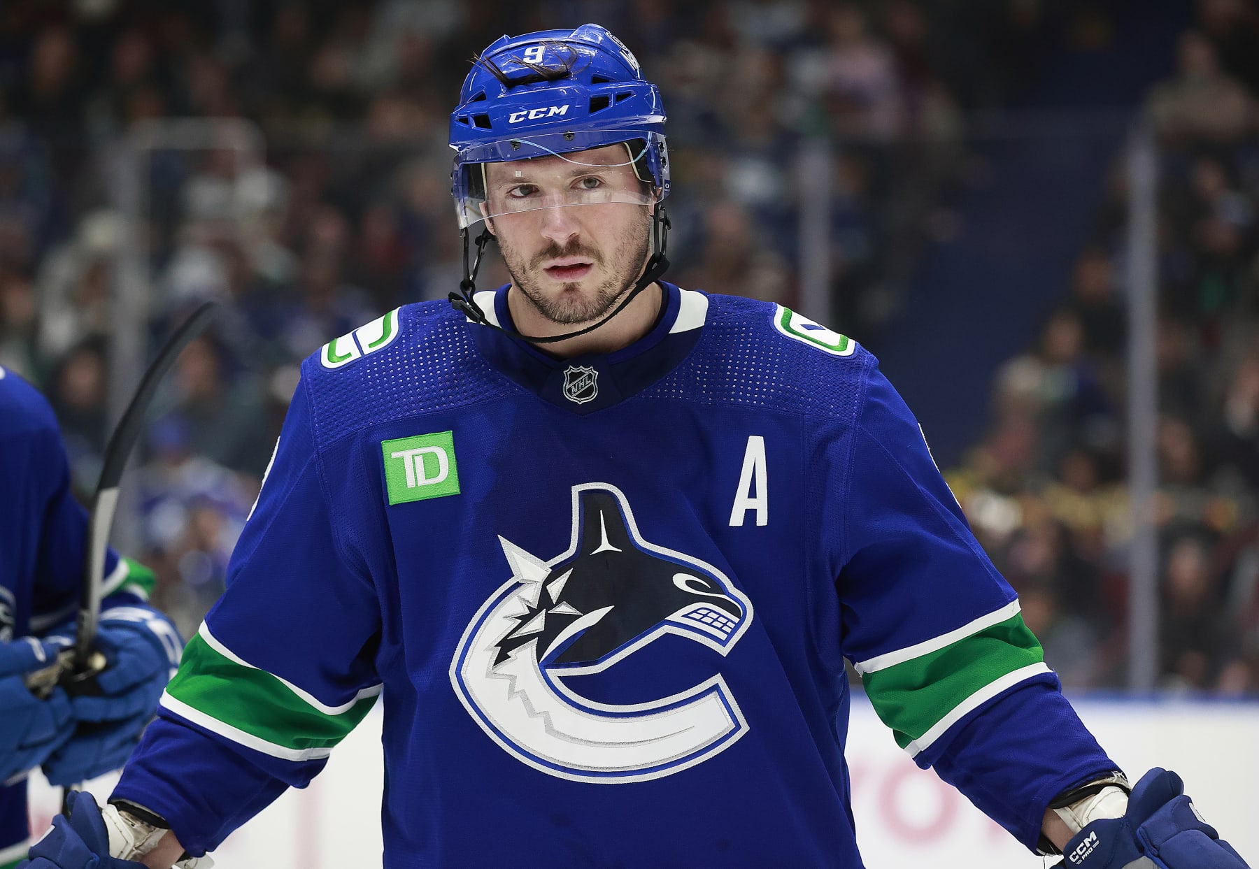 VANCOUVER, CANADA - NOVEMBER 30: J.T. Miller #9 of the Vancouver Canucks skates up ice during their NHL game against the Vegas Golden Knights at Rogers Arena on November 30, 2023 in Vancouver, British Columbia, Canada.  (Photo by Jeff Vinnick/NHLI via Getty Images)
