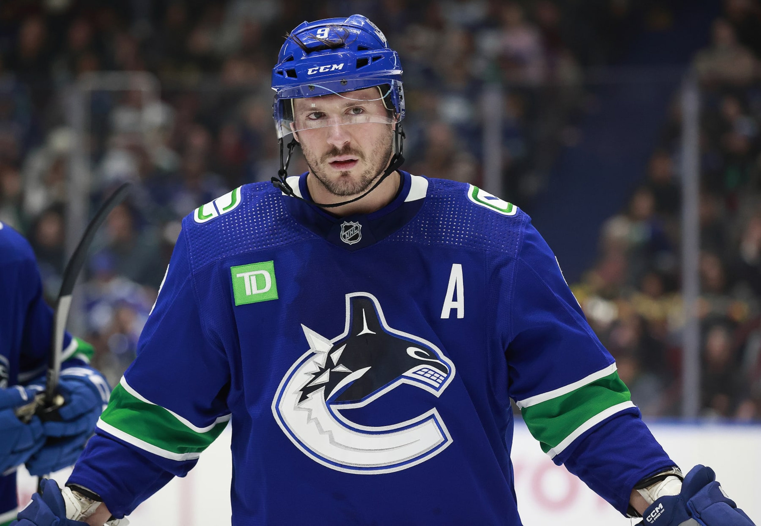 VANCOUVER, CANADA - NOVEMBER 30: J.T. Miller #9 of the Vancouver Canucks skates up ice during their NHL game against the Vegas Golden Knights at Rogers Arena on November 30, 2023 in Vancouver, British Columbia, Canada.  (Photo by Jeff Vinnick/NHLI via Getty Images)