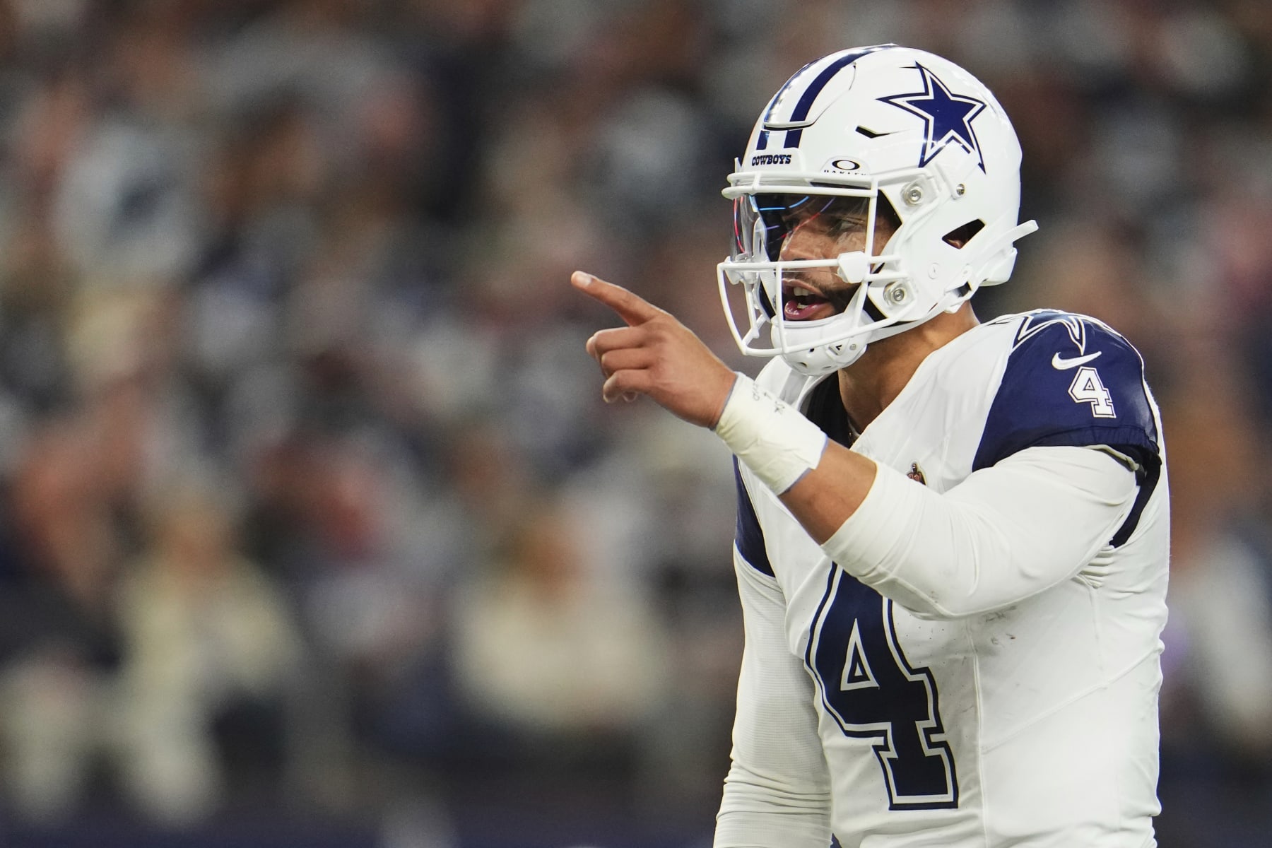 ARLINGTON, TX - DECEMBER 10: Dak Prescott #4 of the Dallas Cowboys calls a play at the line of scrimmage against the Philadelphia Eagles during the first half at AT&T Stadium on December 10, 2023 in Arlington, Texas. (Photo by Cooper Neill/Getty Images)