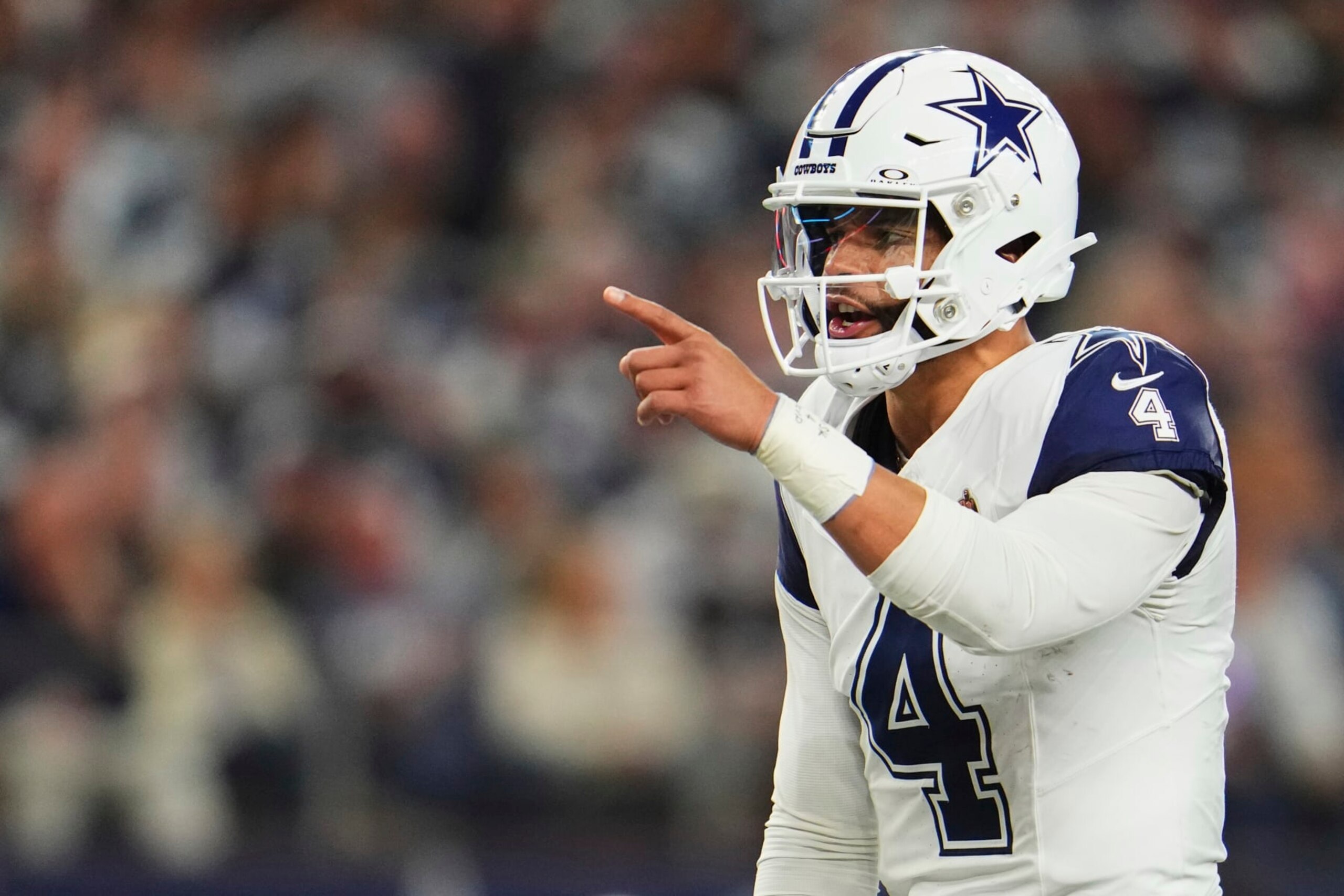 ARLINGTON, TX - DECEMBER 10: Dak Prescott #4 of the Dallas Cowboys calls a play at the line of scrimmage against the Philadelphia Eagles during the first half at AT&T Stadium on December 10, 2023 in Arlington, Texas. (Photo by Cooper Neill/Getty Images)