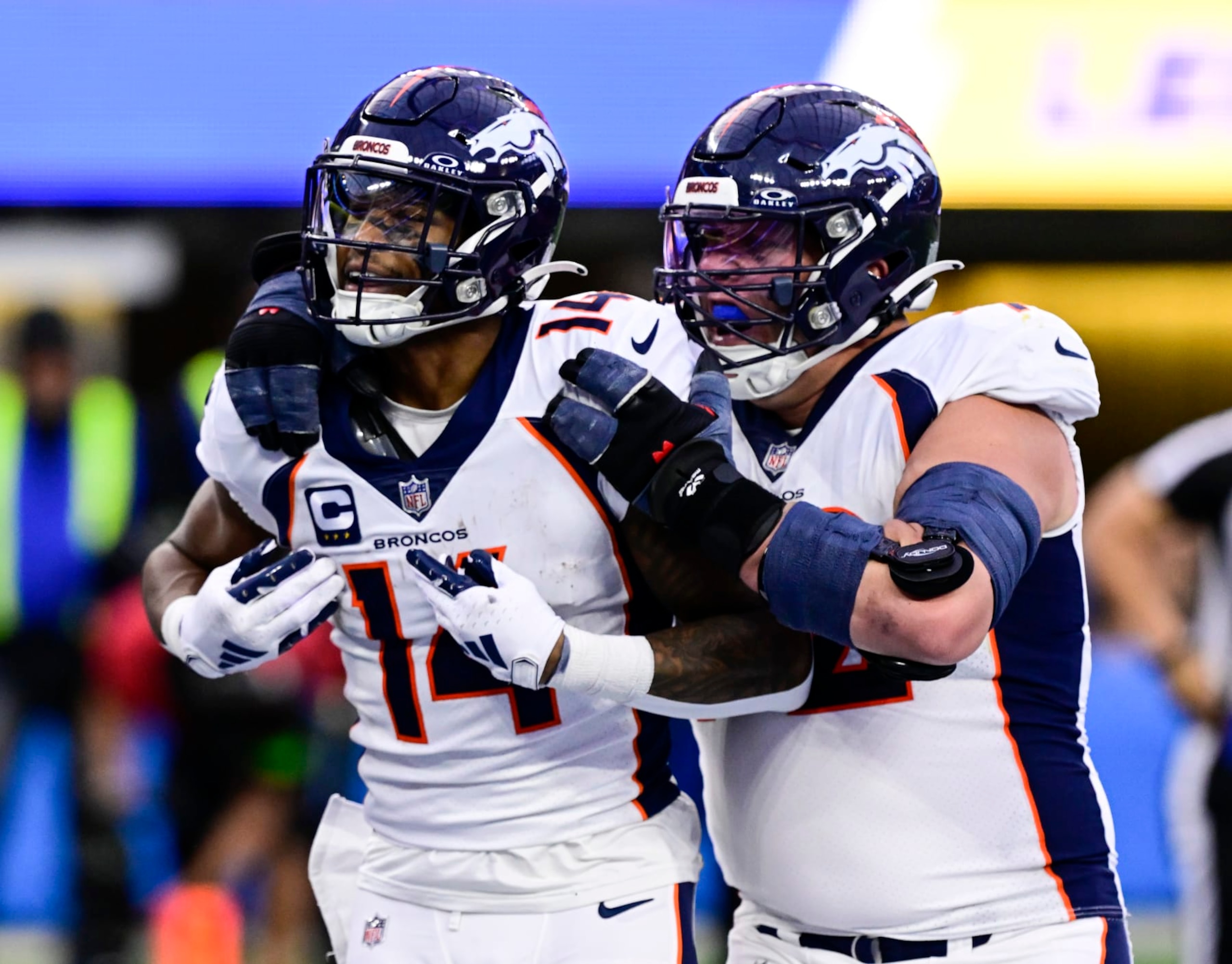 INGLEWOOD, CA - DECEMBER 10: Denver Broncos wide receiver Courtland Sutton (14) celebrates his touchdown with offensive tackle Garett Bolles (72) in the third quarter at SoFi Stadium in Inglewood, California Sunday December 10, 2023. (Photo by Andy Cross/MediaNews Group/The Denver Post via Getty Images)