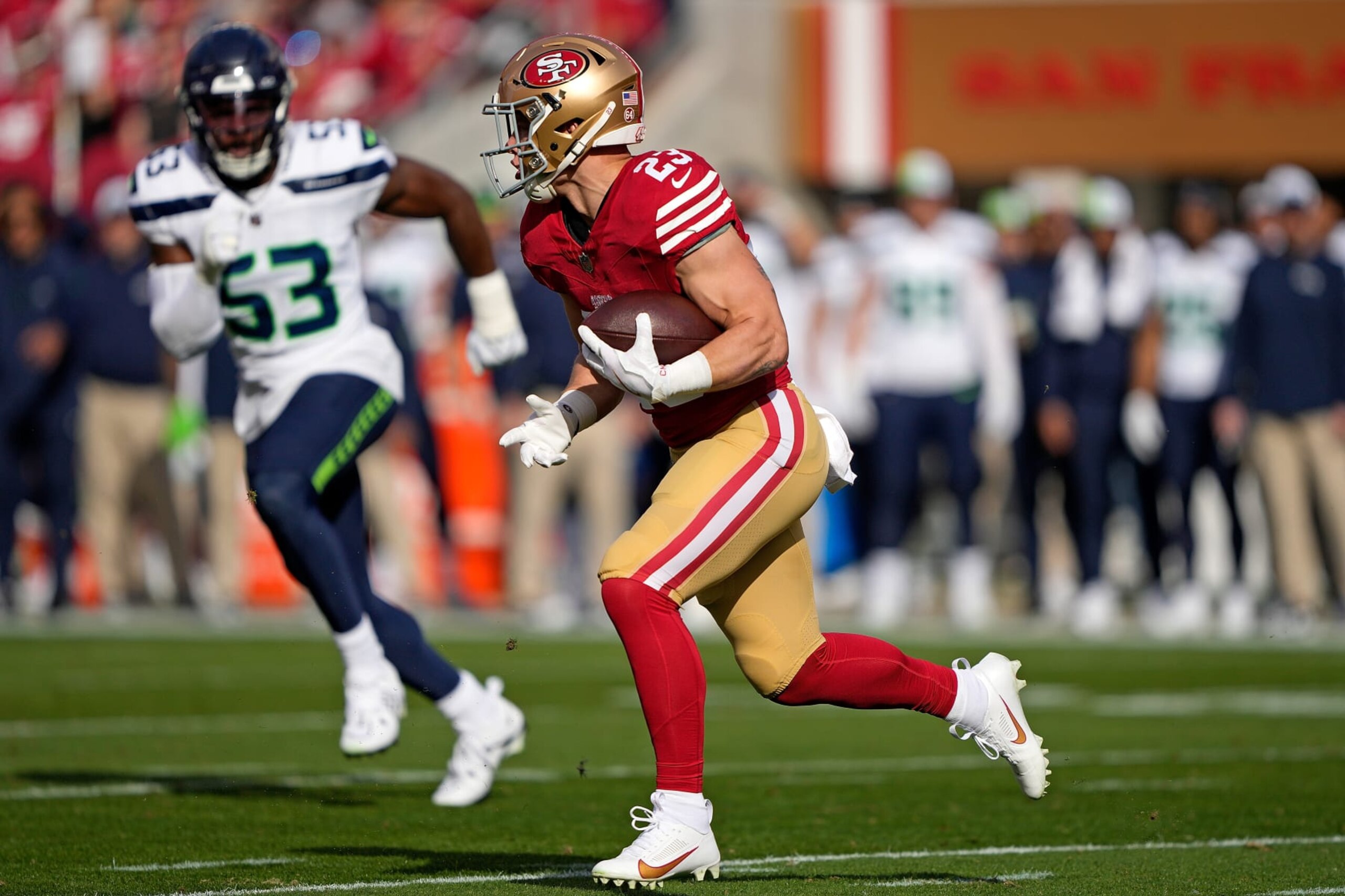 SANTA CLARA, CALIFORNIA - DECEMBER 10: Christian McCaffrey #23 of the San Francisco 49ers runs the ball during the first quarter in the game against the Seattle Seahawks at Levi's Stadium on December 10, 2023 in Santa Clara, California. (Photo by Thearon W. Henderson/Getty Images)