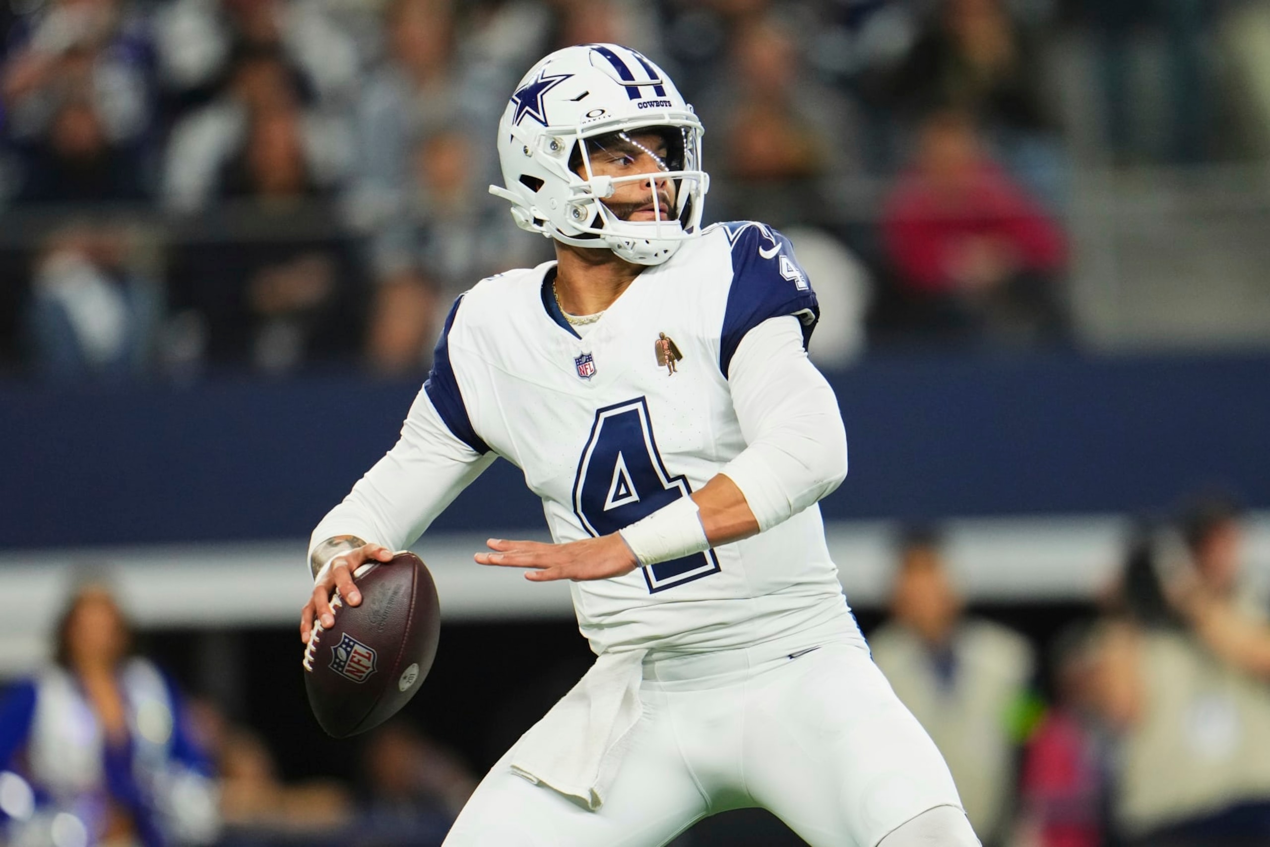 ARLINGTON, TX - DECEMBER 10: Dak Prescott #4 of the Dallas Cowboys drops back to pass against the Philadelphia Eagles during the first half at AT&T Stadium on December 10, 2023 in Arlington, Texas. (Photo by Cooper Neill/Getty Images)