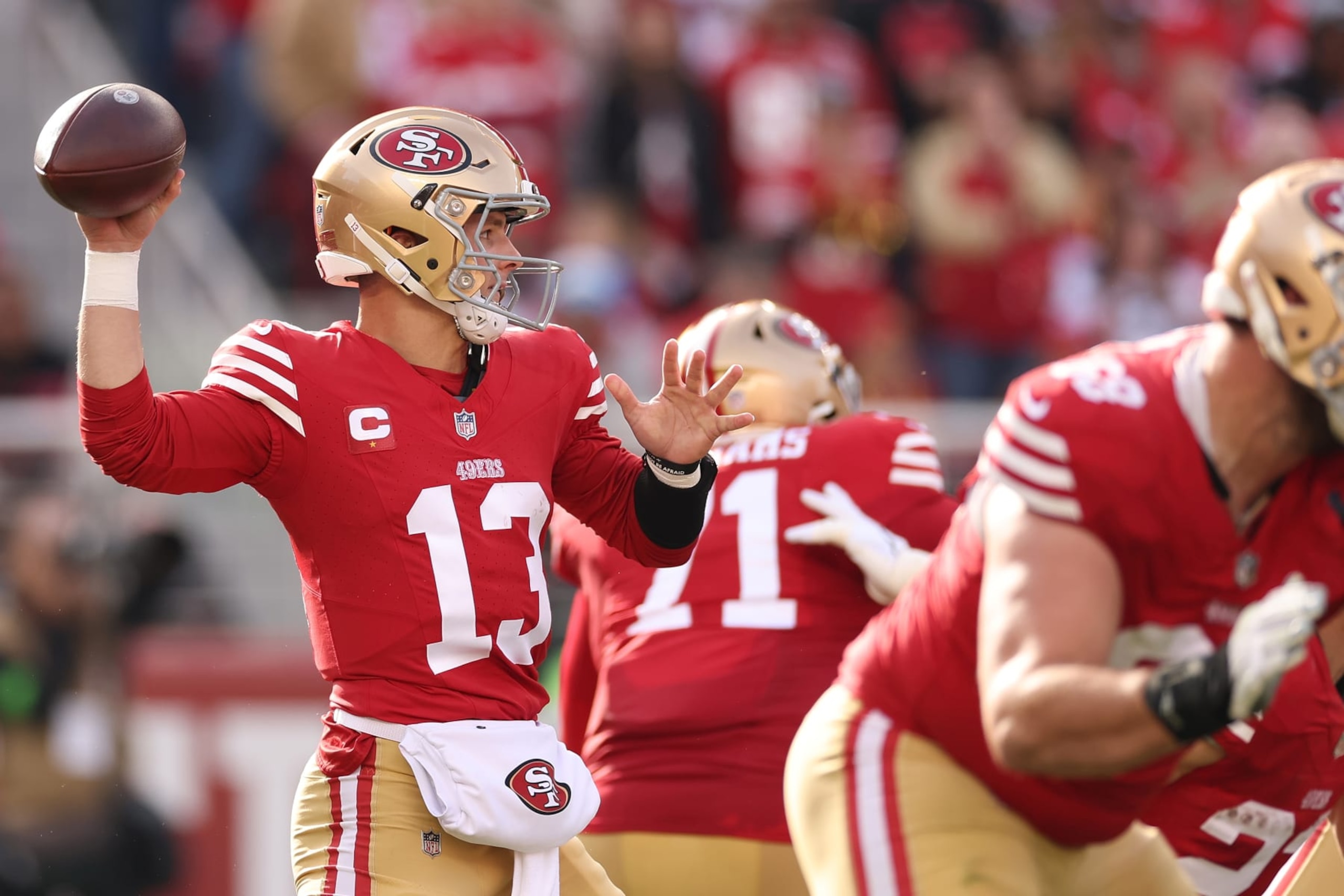 SANTA CLARA, CALIFORNIA - DECEMBER 10: Brock Purdy #13 of the San Francisco 49ers throws a pass during the first quarter in the game against the Seattle Seahawks at Levi's Stadium on December 10, 2023 in Santa Clara, California. (Photo by Ezra Shaw/Getty Images)
