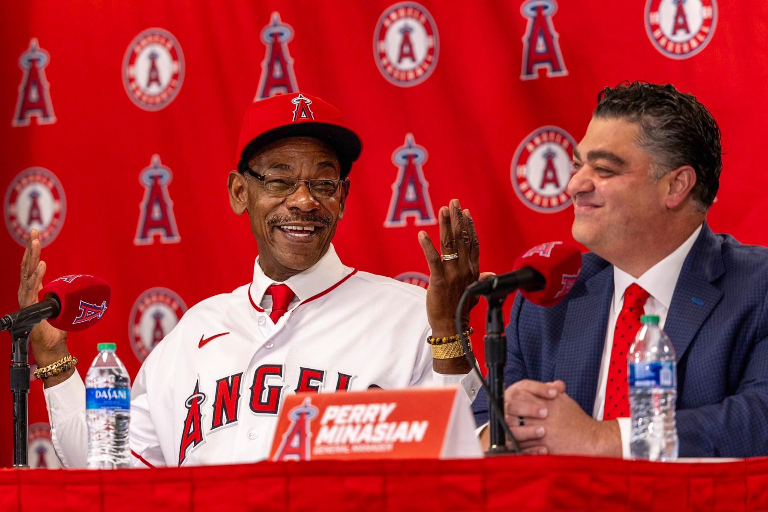 Ron Washington (L) and Perry Minasian (R)