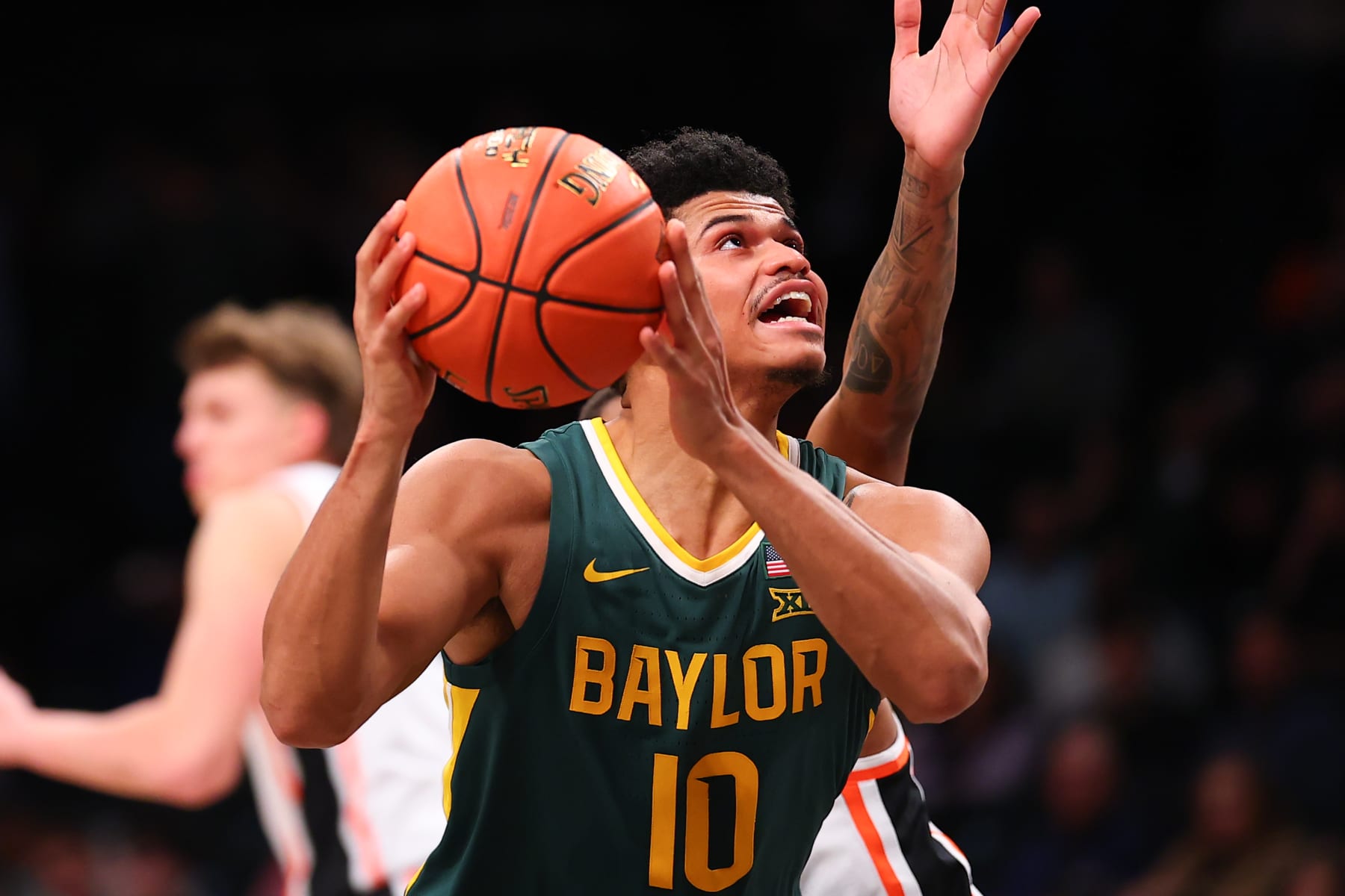 BROOKLYN, NY - NOVEMBER 22:  RayJ Dennis #10 of the Baylor Bears during the NIT Season Tip-Off college basketball game against the Oregon State Beavers on November 22, 2023 at the Barclays Center in Brooklyn, New York.  (Photo by Rich Graessle/Icon Sportswire via Getty Images)