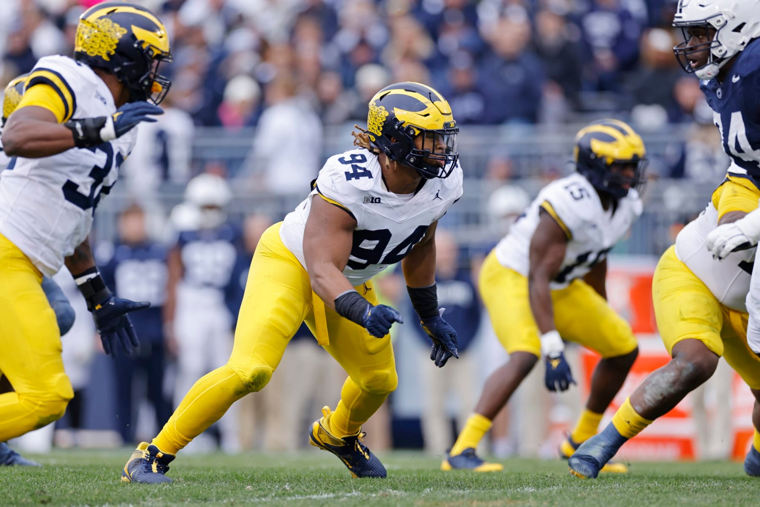 UNIVERSITY PARK, PA - NOVEMBER 11: Michigan Wolverines defensive lineman Kris Jenkins (94) rushes on defense during a college football game against the Penn State Nittany Lions on November 11, 2023 at Beaver Stadium in University Park, Pennsylvania. (Photo by Joe Robbins/Icon Sportswire via Getty Images) UNIVERSITY PARK, PA - NOVEMBER 11: Michigan Wolverines defensive lineman Kris Jenkins (94) rushes on defense during a college football game against the Penn State Nittany Lions on November 11, 2023 at Beaver Stadium in University Park, Pennsylvania. (Photo by Joe Robbins/Icon Sportswire via Getty Images)