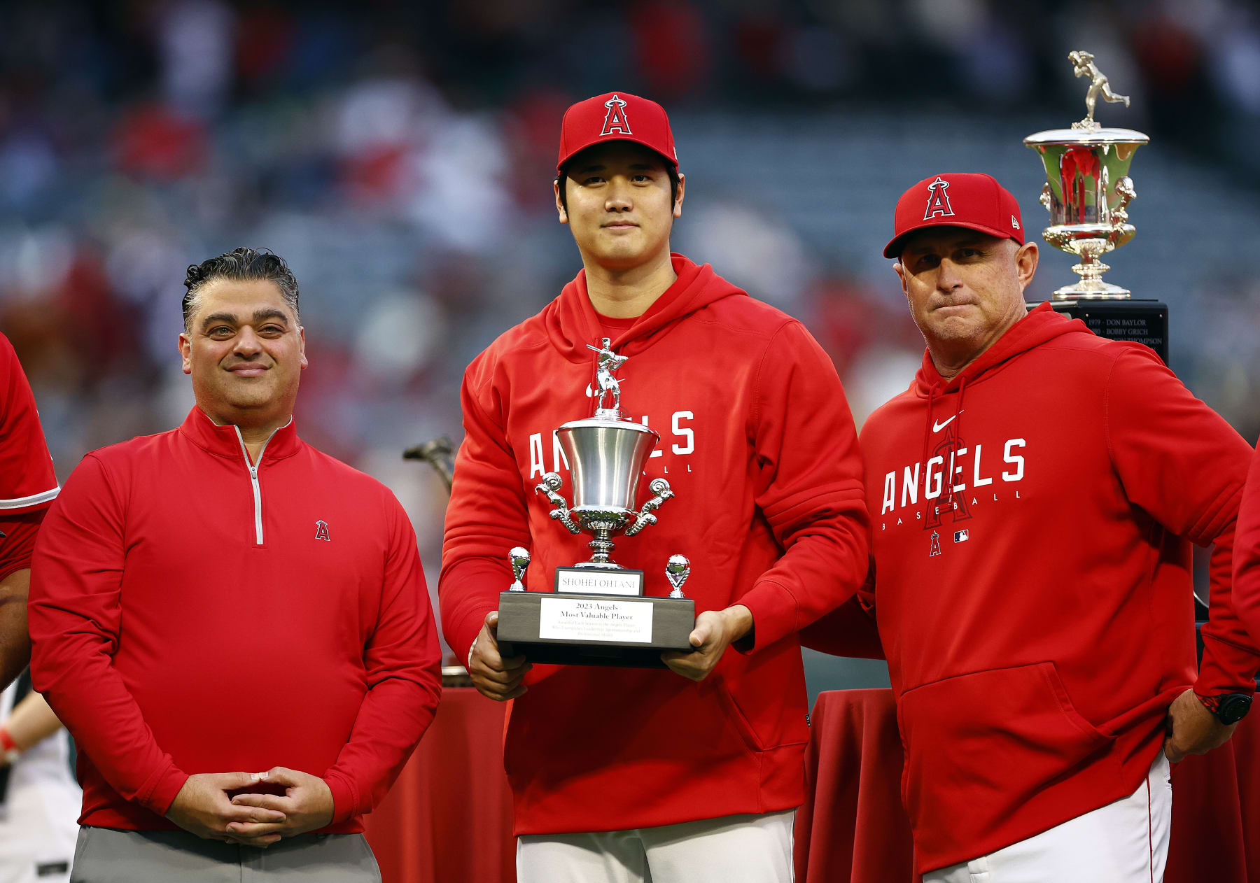 ANAHEIM, CALIFORNIA - SEPTEMBER 30:  General Manager Perry Minasian, Shohei Ohtani #17 of the Los Angeles Angels and Phil Nevin at Angel Stadium of Anaheim on September 30, 2023 in Anaheim, California. (Photo by Ronald Martinez/Getty Images)