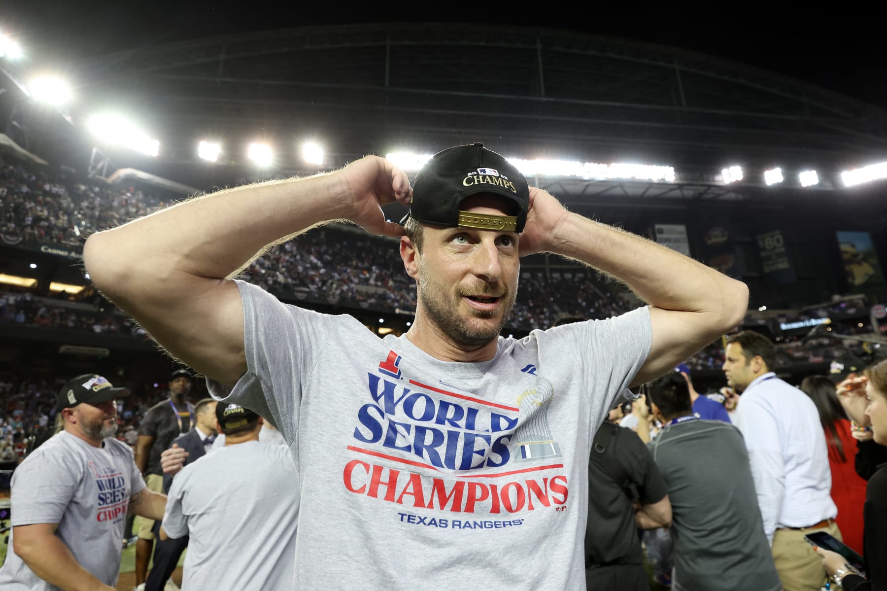 PHOENIX, ARIZONA - NOVEMBER 01: Max Scherzer #31 of the Texas Rangers celebrates after the Texas Rangers beat the Arizona Diamondbacks 5-0 in Game Five to win the World Series at Chase Field on November 01, 2023 in Phoenix, Arizona. (Photo by Christian Petersen/Getty Images)