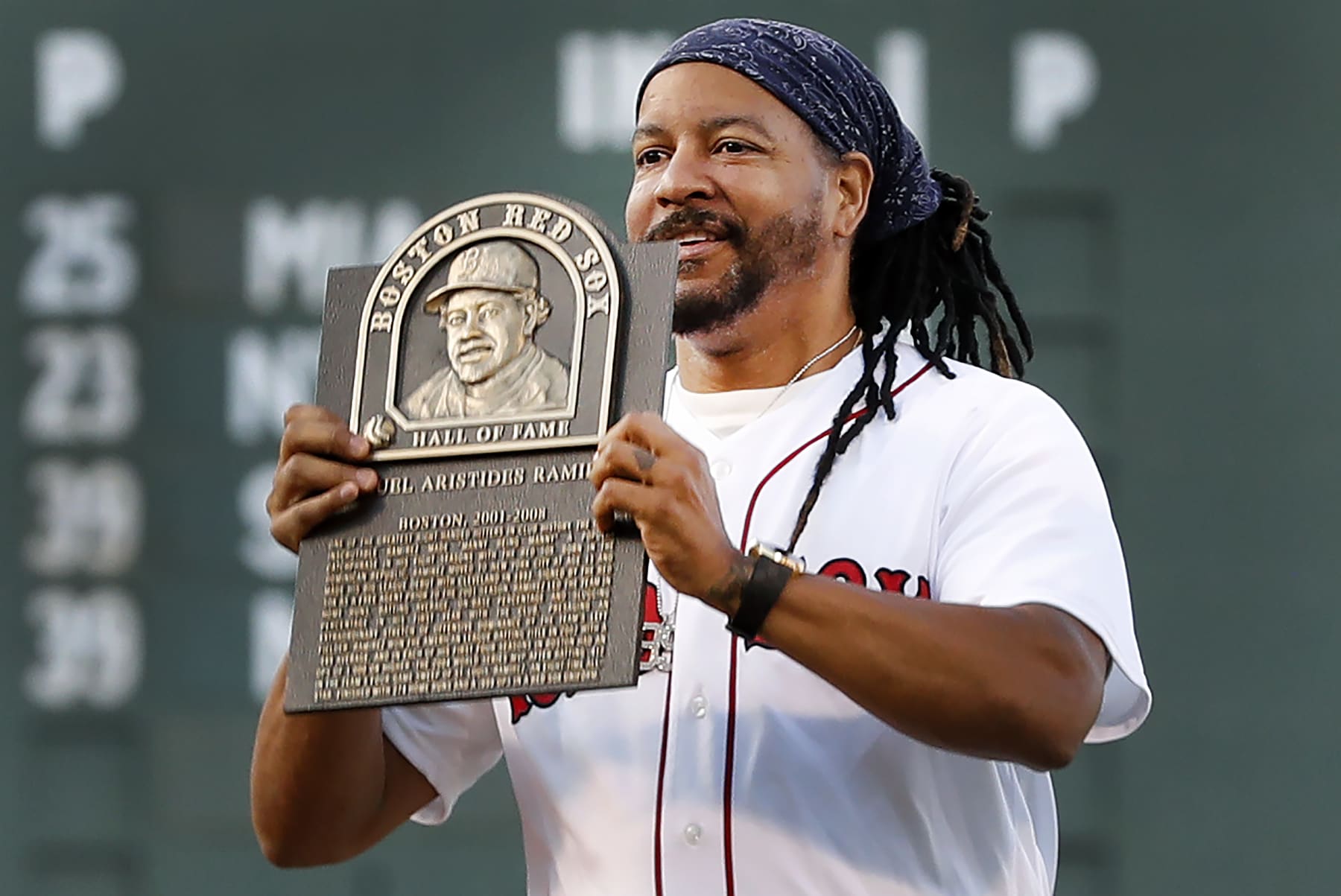 Boston - June 20: Before the game, Manny Ramirez, who was selected for the Red Sox Hall of Fame last month, but who was not present at that ceremony, was on hand to receive his plaque tonight. The Boston Red Sox host the Detroit Tigers in an MLB game at Fenway Park in Boston on June 20, 2022. (Photo by Jim Davis/The Boston Globe via Getty Images)