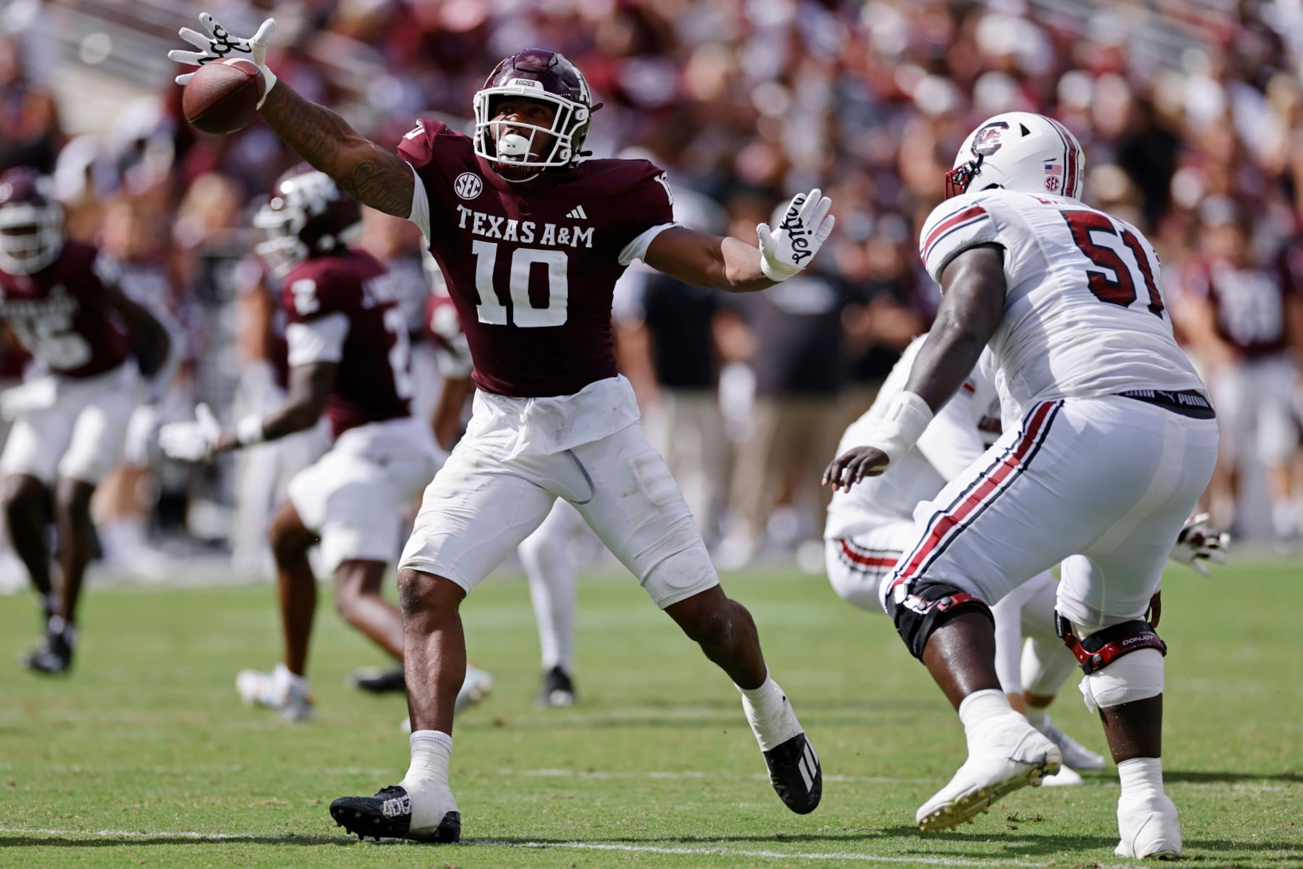 COLLEGE STATION, TX - OCTOBER 28: Texas A&M Aggies defensive lineman Fadil Diggs (10) knocks down a pass during a college football game against the South Carolina Gamecocks on October 28, 2023 at Kyle Field in College Station, Texas. (Photo by Joe Robbins/Icon Sportswire via Getty Images)
