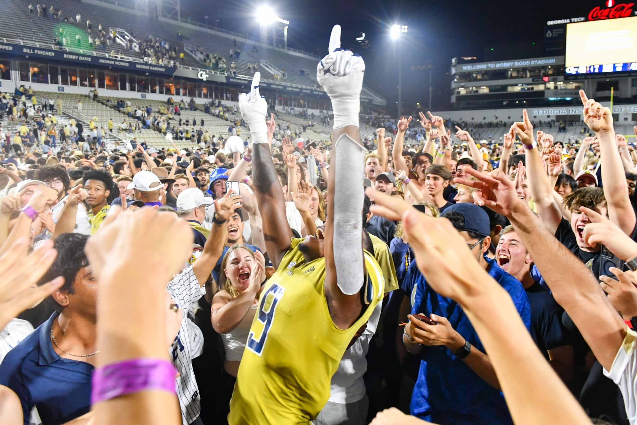 ATLANTA, GA  OCTOBER 28:  Georgia Tech defensive lineman Kyle Kennard (9) reacts as Georgia Tech fans storm the field following the conclusion of the college football game between the North Carolina Tar Heels and the Georgia Tech Yellow Jackets on October 28th, 2023 at Bobby Dodd Stadium in Atlanta, GA.  (Photo by Rich von Biberstein/Icon Sportswire via Getty Images)