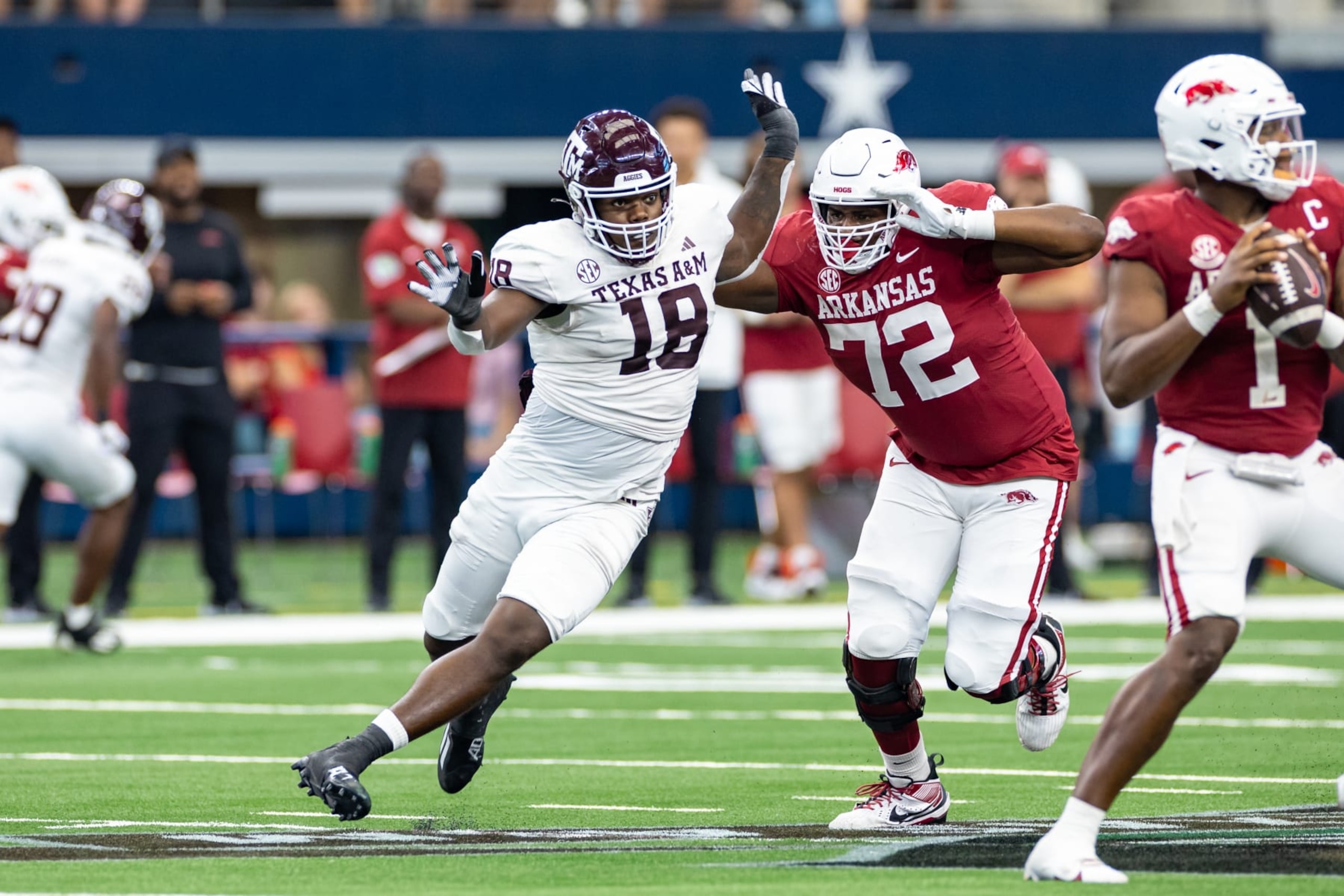 ARLINGTON, TX - SEPTEMBER 30: Texas A&M Aggies defensive lineman LT Overton (#18) rushes the passer during the  Southwest Classic college football game between the Texas A&M Aggies and the Arkansas Razorbacks on September 30, 2023 at AT&T Stadium in Arlington, TX.  (Photo by Matthew Visinsky/Icon Sportswire via Getty Images)