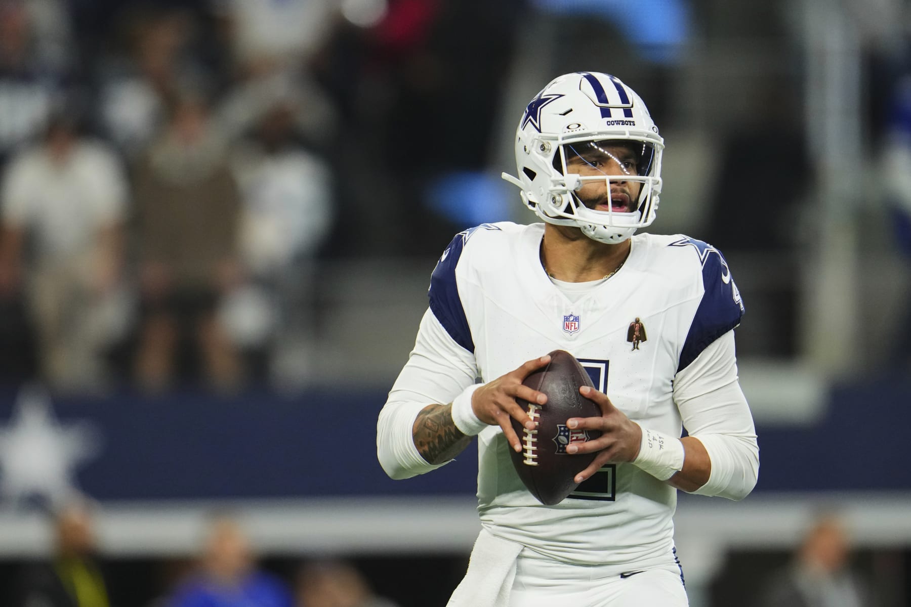 ARLINGTON, TX - DECEMBER 10: Dak Prescott #4 of the Dallas Cowboys drops back to pass against the Philadelphia Eagles during the first half at AT&T Stadium on December 10, 2023 in Arlington, Texas. (Photo by Cooper Neill/Getty Images)