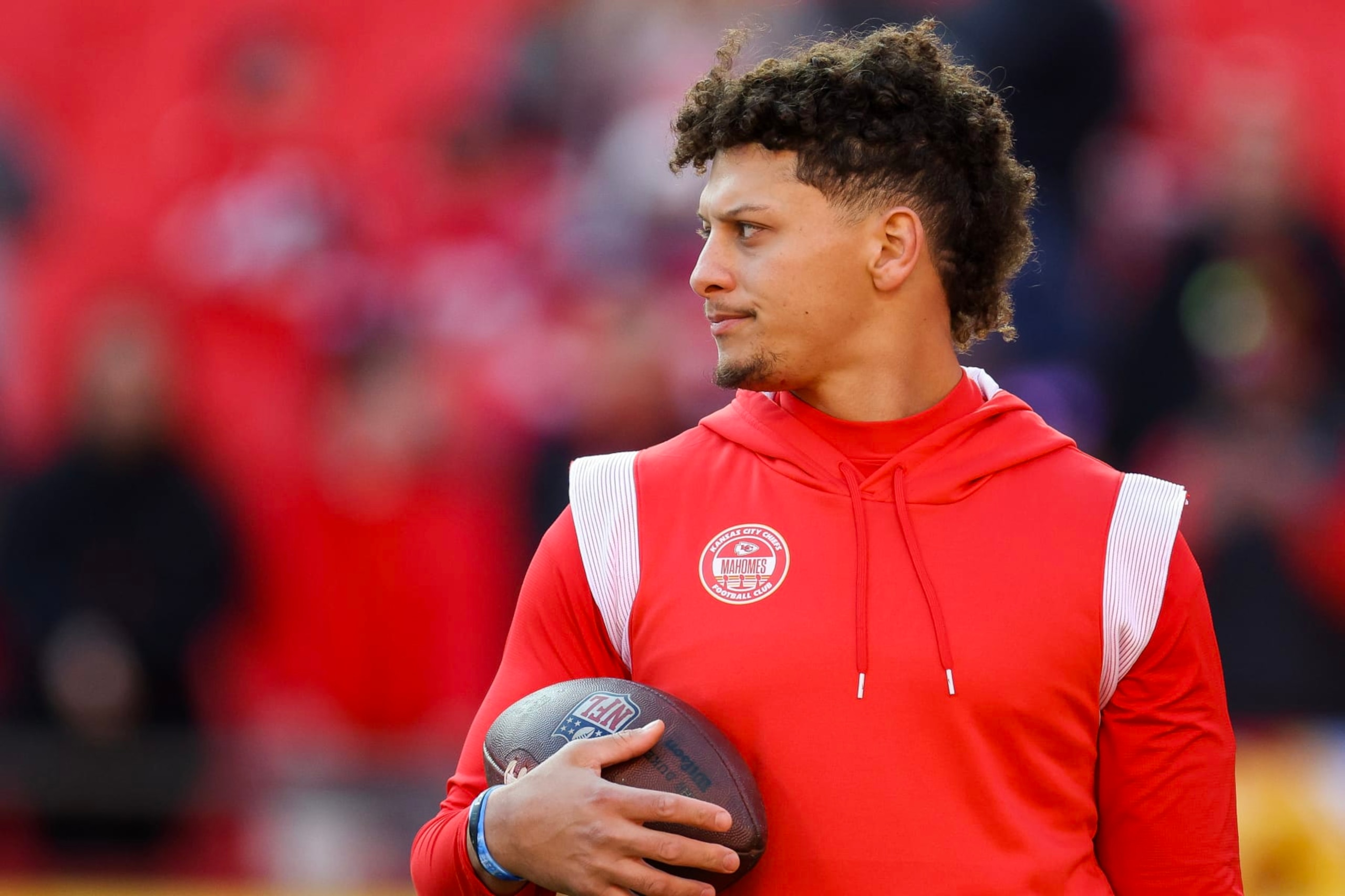 KANSAS CITY, MISSOURI - DECEMBER 10: Patrick Mahomes #15 of the Kansas City Chiefs warms up before the game against the Buffalo Bills at GEHA Field at Arrowhead Stadium on December 10, 2023 in Kansas City, Missouri. (Photo by Jamie Squire/Getty Images)