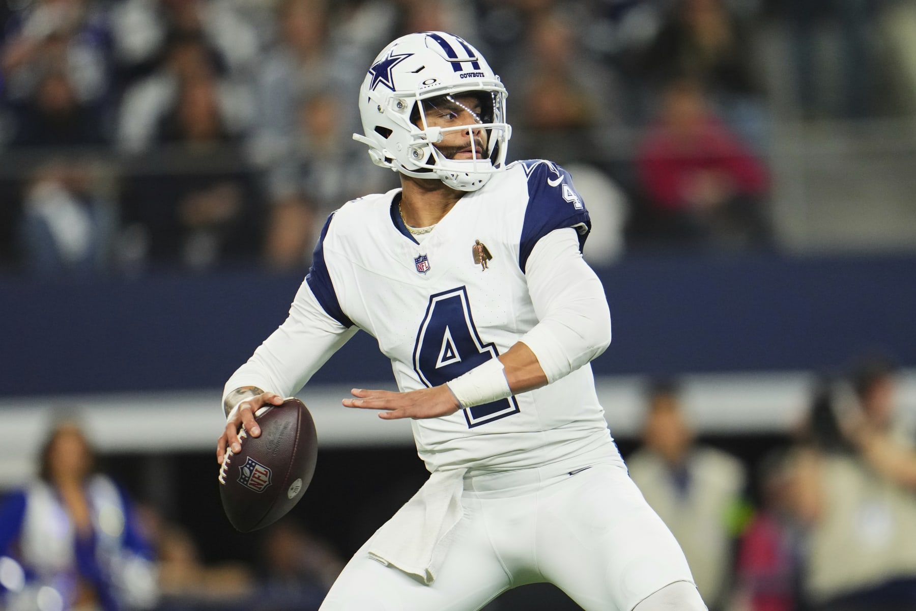 ARLINGTON, TX - DECEMBER 10: Dak Prescott #4 of the Dallas Cowboys drops back to pass against the Philadelphia Eagles during the first half at AT&T Stadium on December 10, 2023 in Arlington, Texas. (Photo by Cooper Neill/Getty Images)