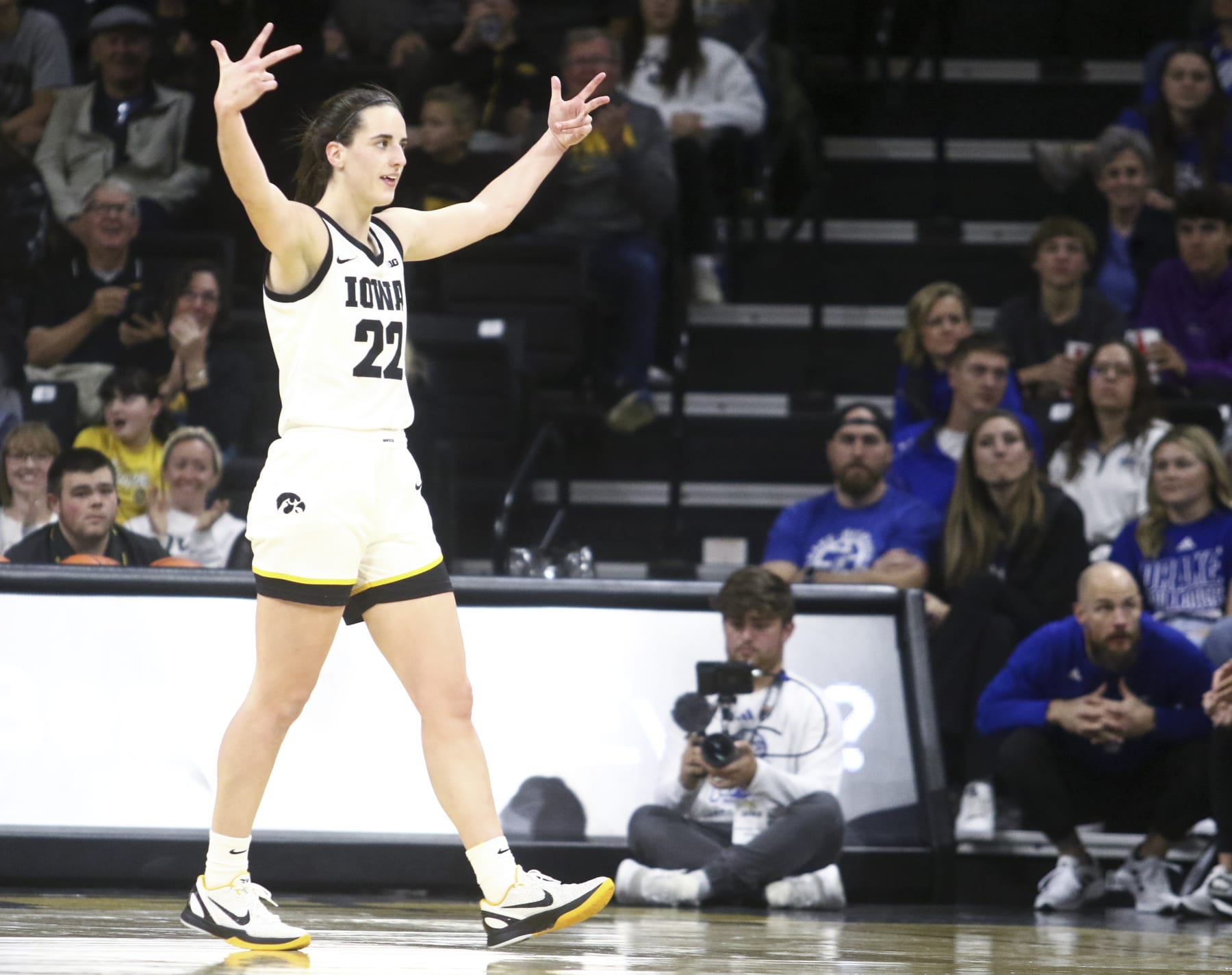 IOWA CITY, IOWA- NOVEMBER 19:  Guard Caitlin Clark #22 of the Iowa Hawkeyes gestures to the crowd after a basket during the second half against the Drake Bulldogs at Carver-Hawkeye Arena on November 19, 2023 in Iowa City, Iowa.  (Photo by Matthew Holst/Getty Images)