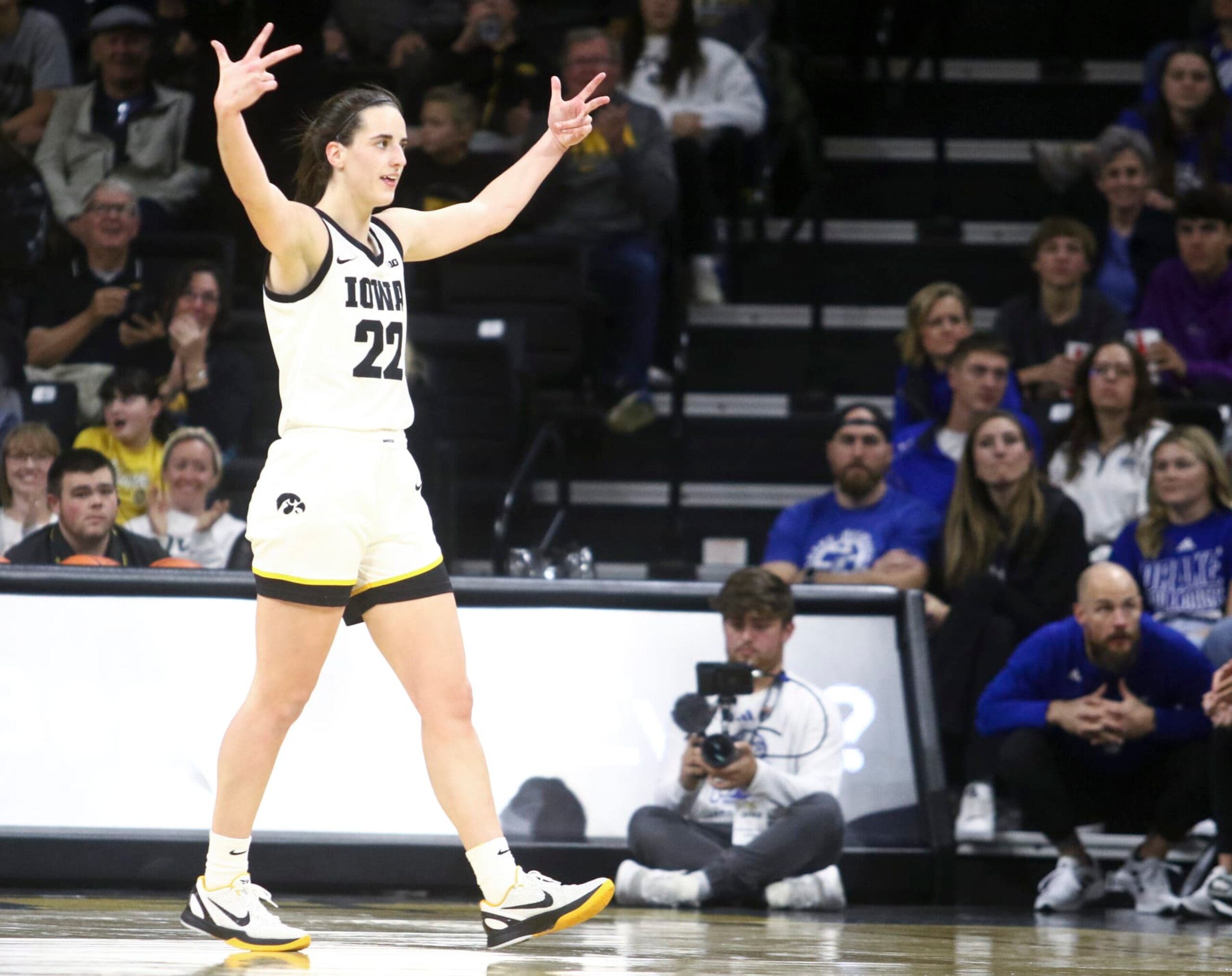 IOWA CITY, IOWA- NOVEMBER 19:  Guard Caitlin Clark #22 of the Iowa Hawkeyes gestures to the crowd after a basket during the second half against the Drake Bulldogs at Carver-Hawkeye Arena on November 19, 2023 in Iowa City, Iowa.  (Photo by Matthew Holst/Getty Images)
