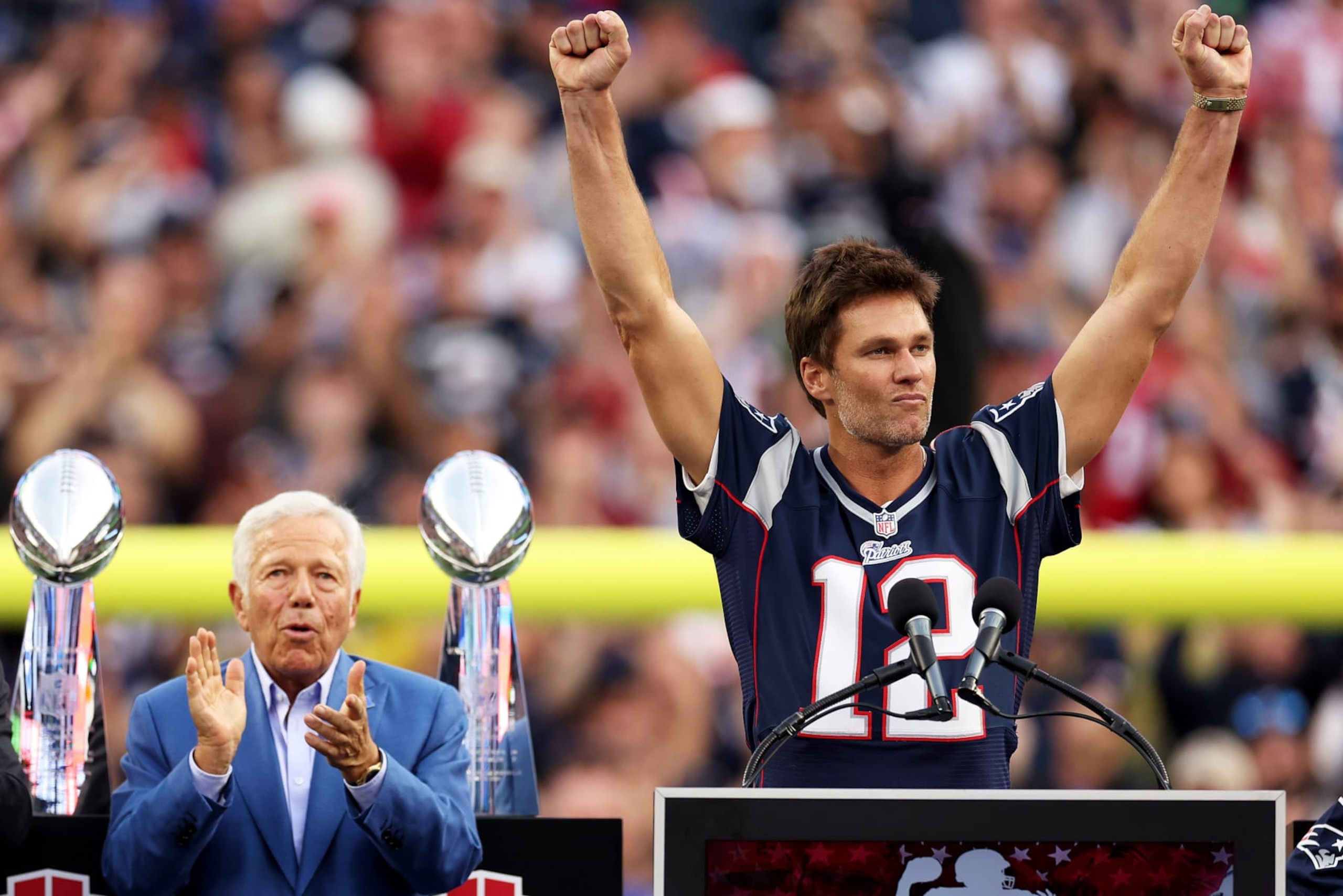 FOXBOROUGH, MASSACHUSETTS - SEPTEMBER 10: Former New England Patriots quarterback Tom Brady speaks next to Patriots Owner Robert Kraft during a ceremony honoring him at halftime of New England's game against the Philadelphia Eagles at Gillette Stadium on September 10, 2023 in Foxborough, Massachusetts. (Photo by Maddie Meyer/Getty Images) FOXBOROUGH, MASSACHUSETTS - SEPTEMBER 10: Former New England Patriots quarterback Tom Brady speaks next to Patriots Owner Robert Kraft during a ceremony honoring him at halftime of New England's game against the Philadelphia Eagles at Gillette Stadium on September 10, 2023 in Foxborough, Massachusetts. (Photo by Maddie Meyer/Getty Images)