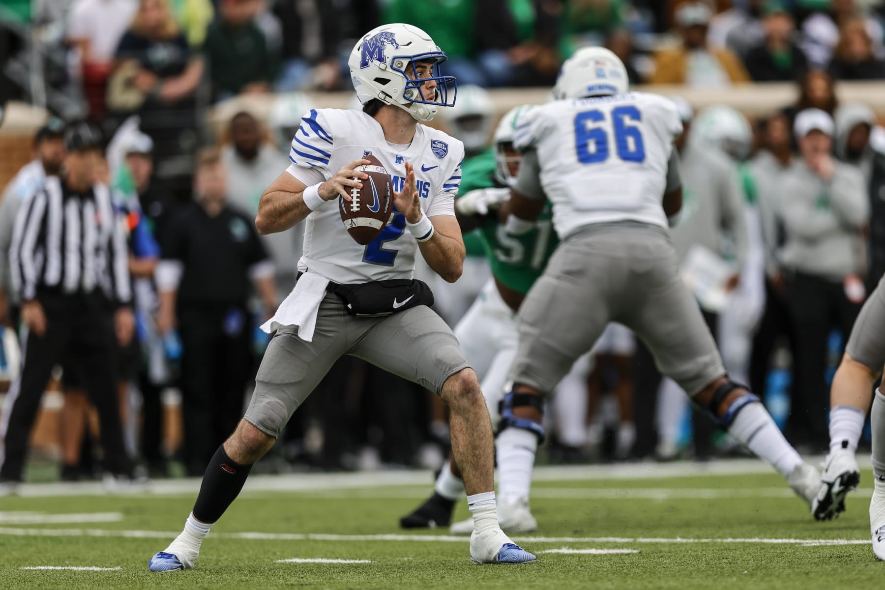 DENTON, TX - OCTOBER 28: Memphis Tigers quarterback Seth Henigan (2) looks downfield for an open receiver during the game between the North Texas Mean Green and the Memphis Tigers on October 28, 2023 at DATCU Stadium in Denton, Texas. (Photo by Matthew Pearce/Icon Sportswire via Getty Images)