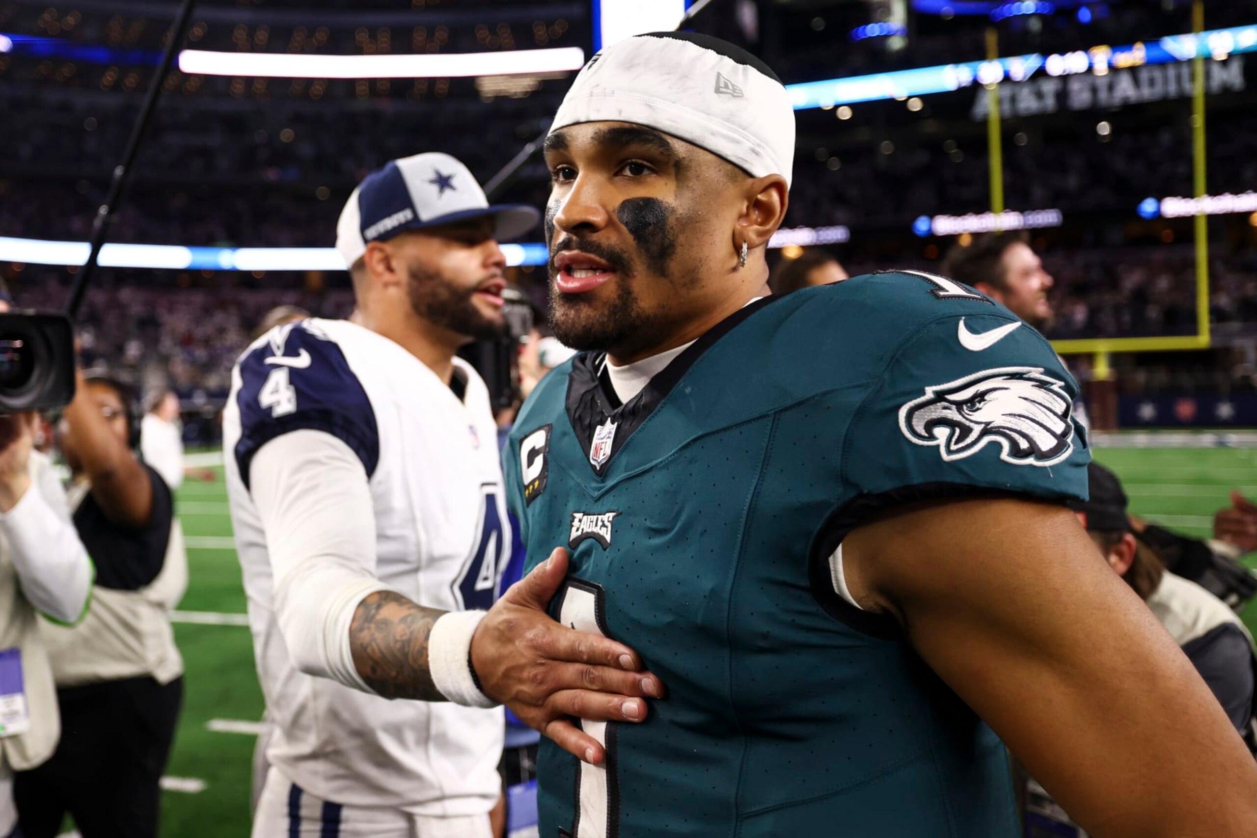 ARLINGTON, TX - DECEMBER 10: Jalen Hurts #1 of the Philadelphia Eagles walks away after talking with Dak Prescott #4 of the Dallas Cowboys after an NFL football game at AT&T Stadium on December 10, 2023 in Arlington, Texas. (Photo by Kevin Sabitus/Getty Images)