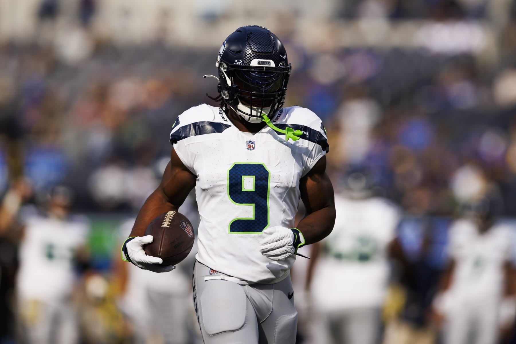 INGLEWOOD, CALIFORNIA - NOVEMBER 19: Kenneth Walker III #9 of the Seattle Seahawks runs with the ball during a game against the Los Angeles Rams at SoFi Stadium on November 19, 2023 in Inglewood, California. (Photo by Ric Tapia/Getty Images)