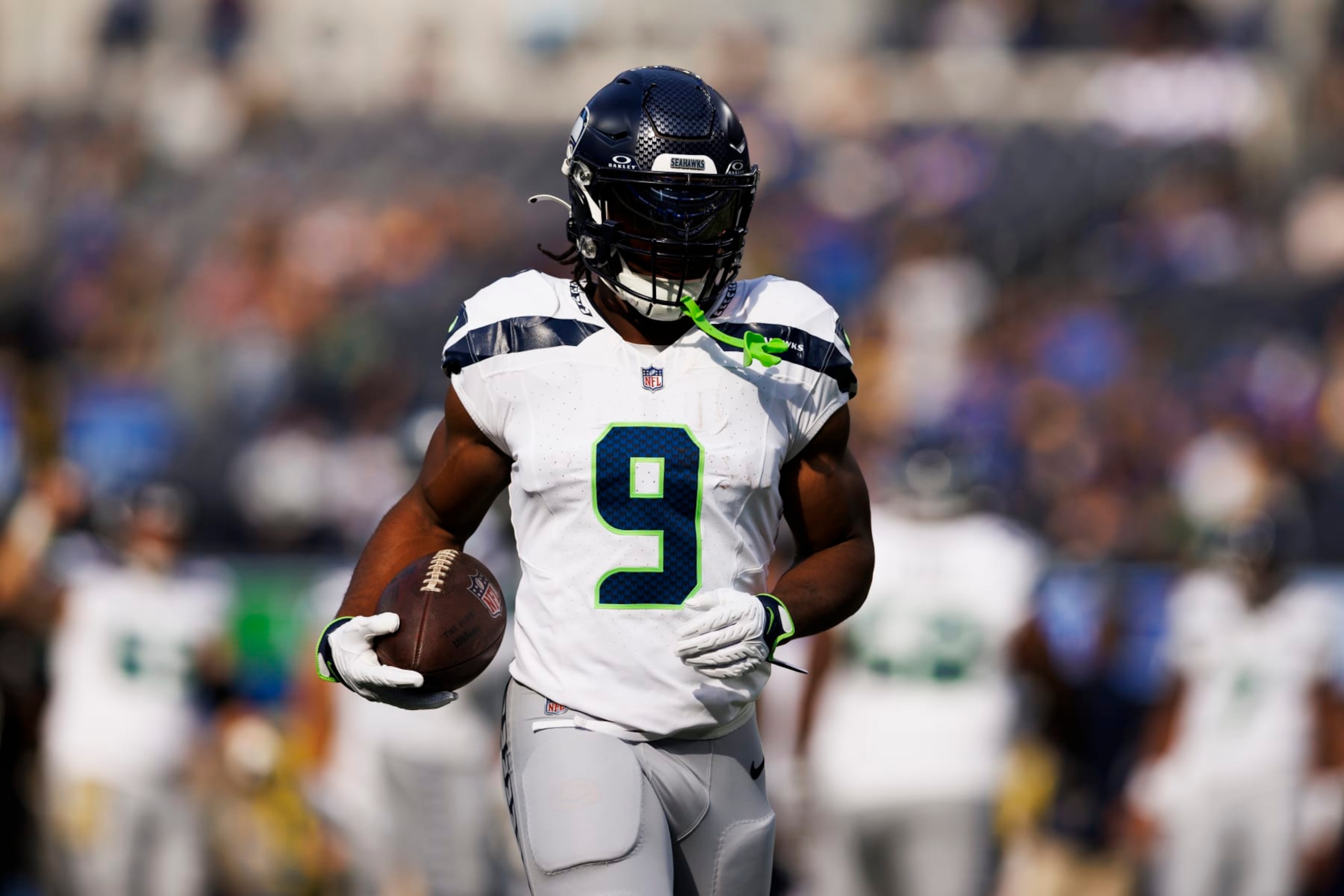 INGLEWOOD, CALIFORNIA - NOVEMBER 19: Kenneth Walker III #9 of the Seattle Seahawks runs with the ball during a game against the Los Angeles Rams at SoFi Stadium on November 19, 2023 in Inglewood, California. (Photo by Ric Tapia/Getty Images)