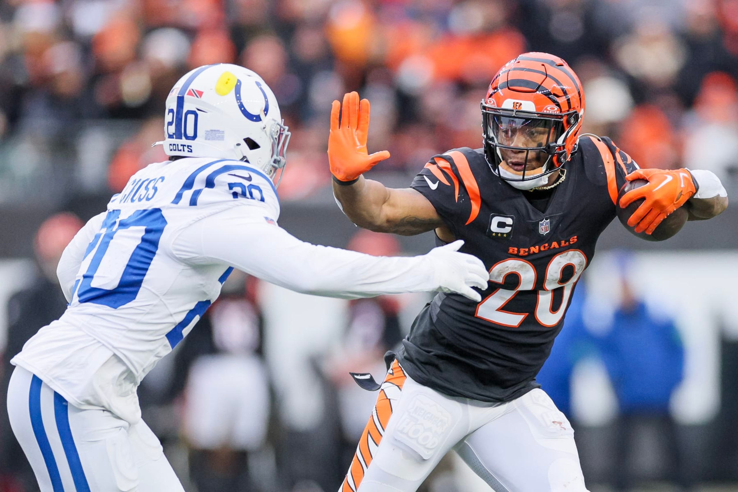 CINCINNATI, OHIO - DECEMBER 10: Joe Mixon #28 of the Cincinnati Bengals carries the ball during the second half of the game against the Indianapolis Colts at Paycor Stadium on December 10, 2023 in Cincinnati, Ohio. (Photo by Andy Lyons/Getty Images)