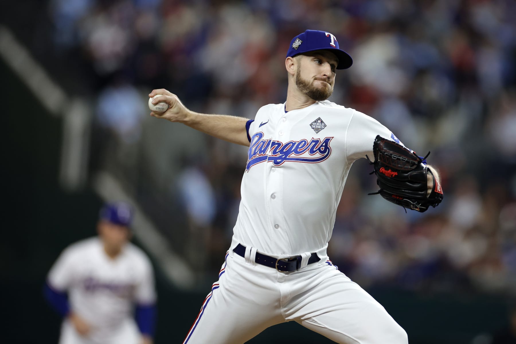 ARLINGTON, TEXAS - OCTOBER 28: Chris Stratton #35 of the Texas Rangers pitches in the eighth inning against the Arizona Diamondbacks during Game Two of the World Series at Globe Life Field on October 28, 2023 in Arlington, Texas. (Photo by Carmen Mandato/Getty Images)