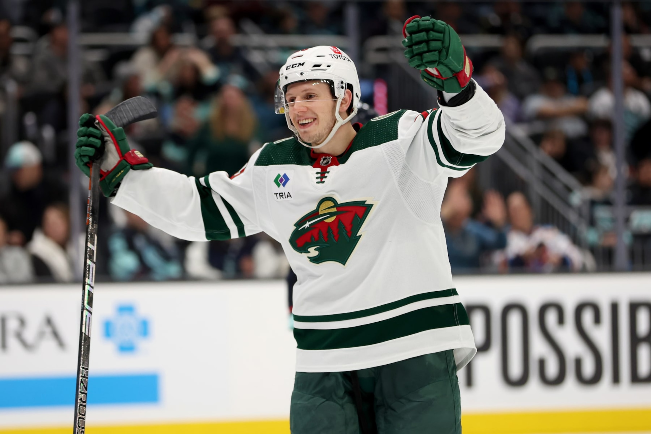 SEATTLE, WASHINGTON - DECEMBER 10: Marco Rossi #23 of the Minnesota Wild celebrates his goal against the Seattle Kraken during the third period at Climate Pledge Arena on December 10, 2023 in Seattle, Washington. (Photo by Steph Chambers/Getty Images)