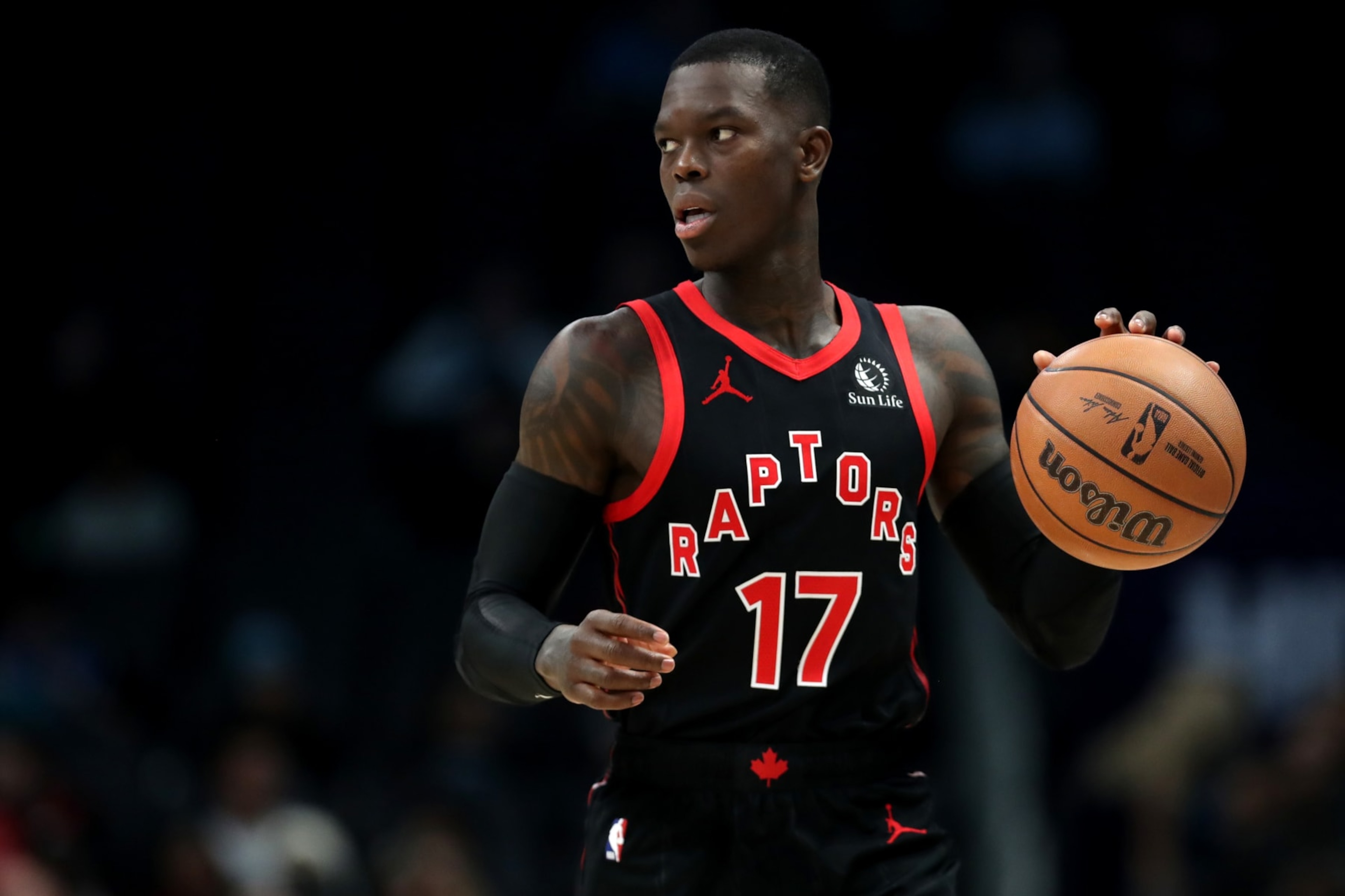 CHARLOTTE, NORTH CAROLINA - DECEMBER 08: Dennis Schroder #17 of the Toronto Raptors brings the ball down the court during the first half of an NBA game against the Charlotte Hornets at Spectrum Center on December 08, 2023 in Charlotte, North Carolina. NOTE TO USER: User expressly acknowledges and agrees that, by downloading and or using this photograph, User is consenting to the terms and conditions of the Getty Images License Agreement. (Photo by David Jensen/Getty Images) CHARLOTTE, NORTH CAROLINA - DECEMBER 08: Dennis Schroder #17 of the Toronto Raptors brings the ball down the court during the first half of an NBA game against the Charlotte Hornets at Spectrum Center on December 08, 2023 in Charlotte, North Carolina. NOTE TO USER: User expressly acknowledges and agrees that, by downloading and or using this photograph, User is consenting to the terms and conditions of the Getty Images License Agreement. (Photo by David Jensen/Getty Images)