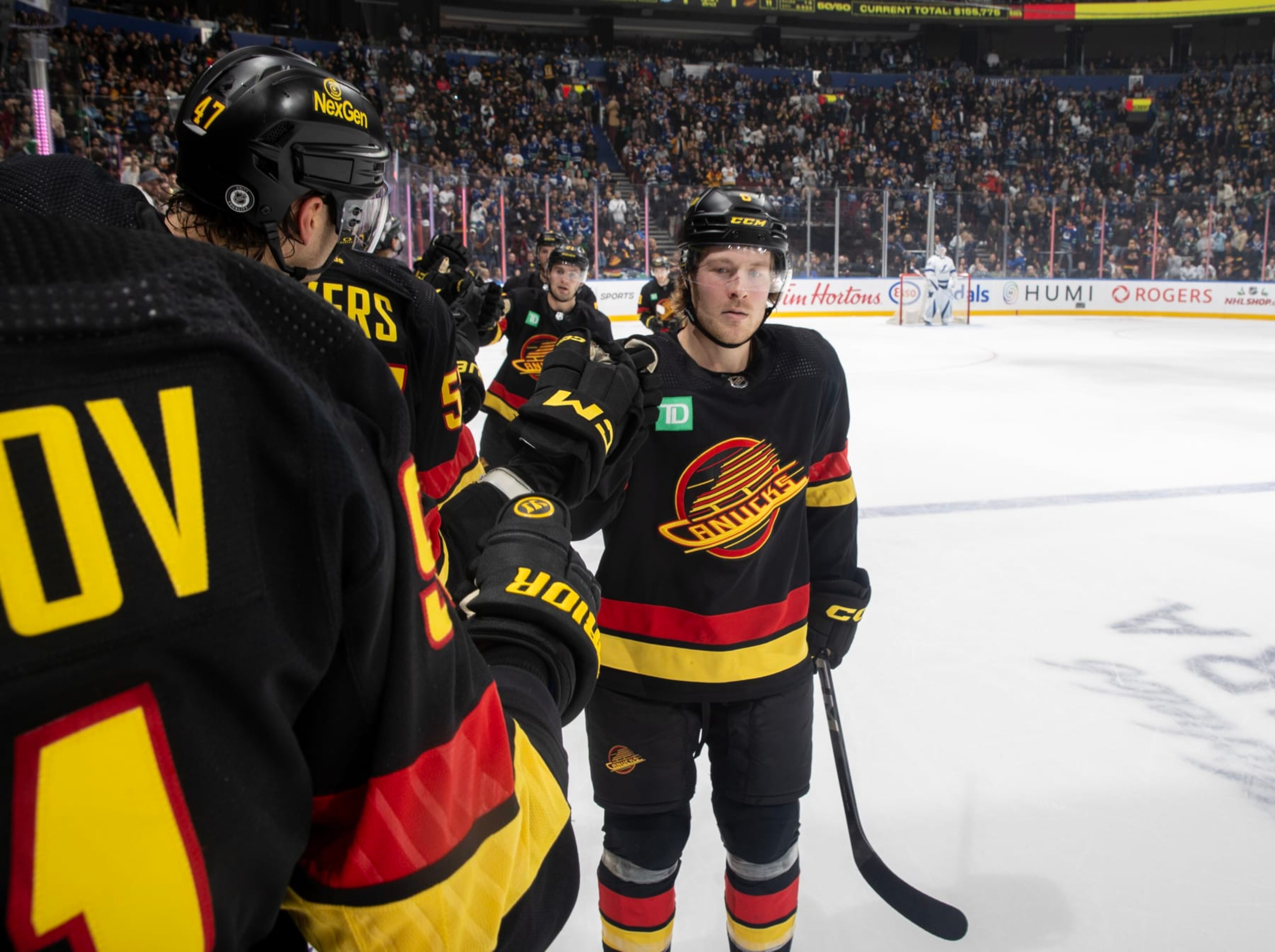 VANCOUVER, CANADA - DECEMBER 12: Brock Boeser #6 of the Vancouver Canucks celebrates his goal with teammates during the second period of their NHL game against the Tampa Bay Lightningat Rogers Arena on December 12, 2023 in Vancouver, British Columbia, Canada. (Photo by Jeff Vinnick/NHLI via Getty Images) VANCOUVER, CANADA - DECEMBER 12: Brock Boeser #6 of the Vancouver Canucks celebrates his goal with teammates during the second period of their NHL game against the Tampa Bay Lightningat Rogers Arena on December 12, 2023 in Vancouver, British Columbia, Canada. (Photo by Jeff Vinnick/NHLI via Getty Images)
